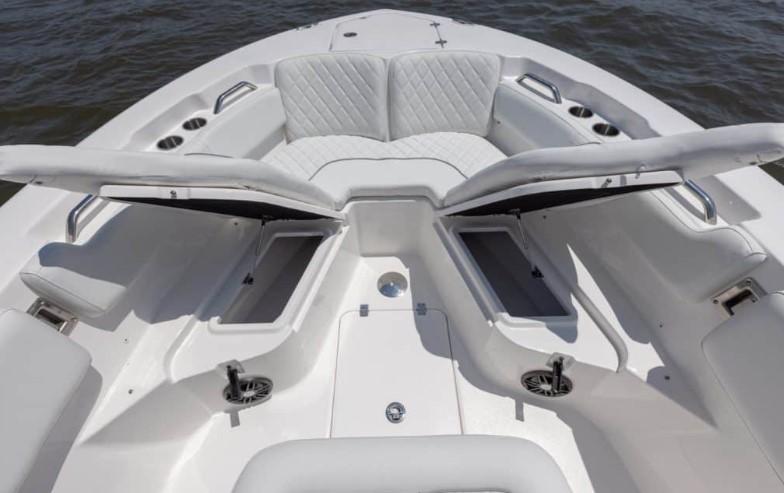 2026 Sea Fox 228 Commander boat interior with open storage compartments and cushioned seating.