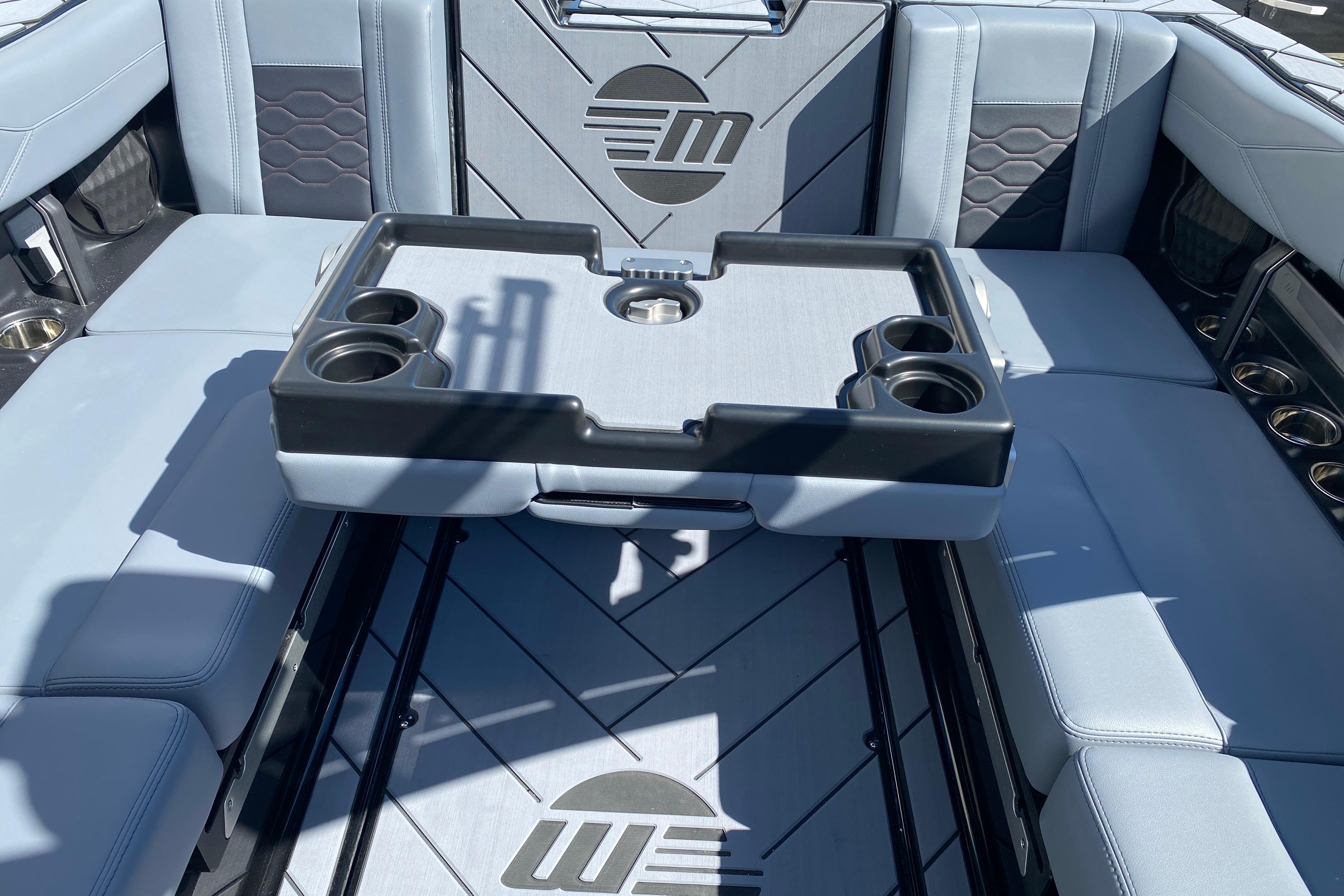 Interior of 2025 Malibu Wakesetter 23 LSV with seating and cup holders.