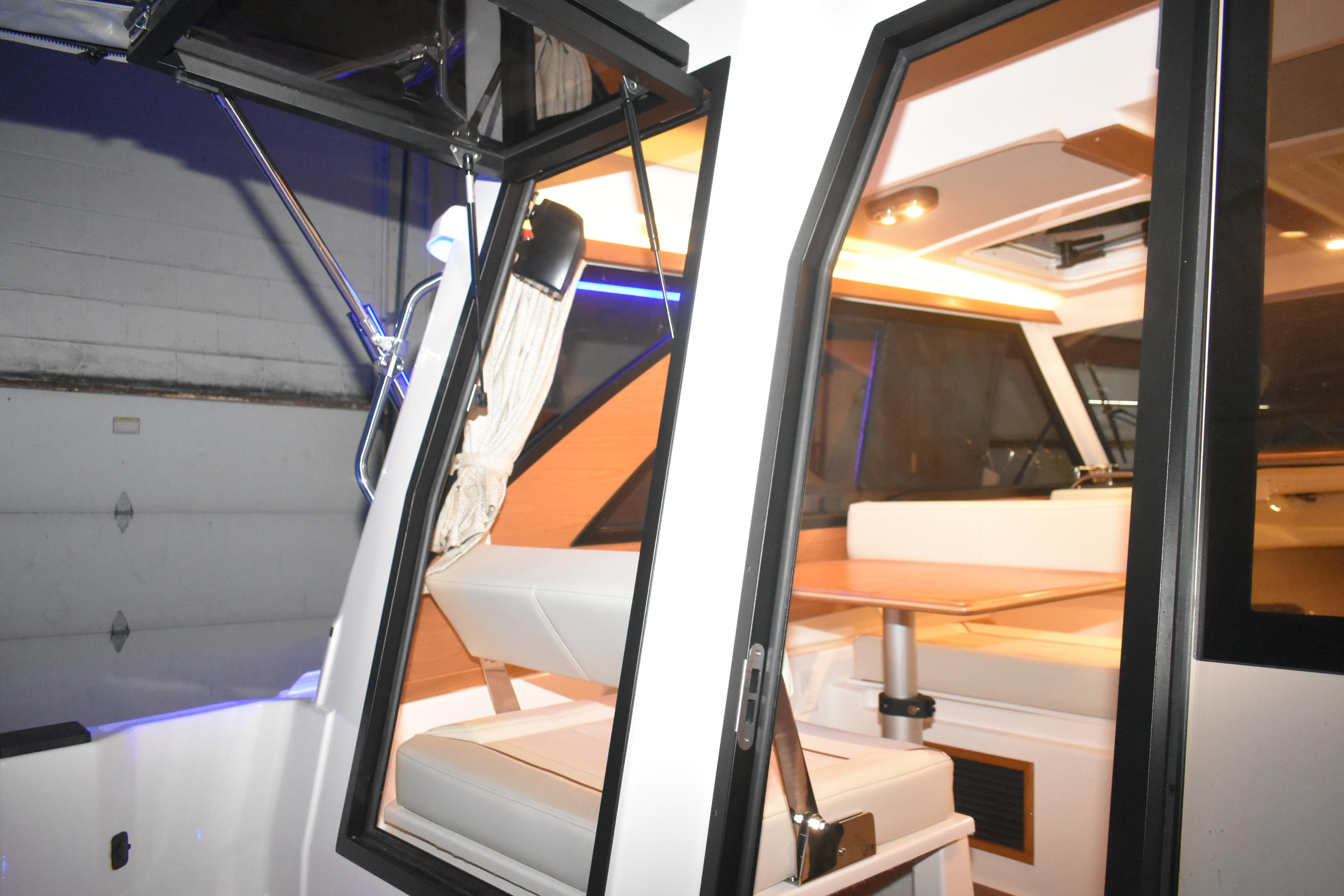 2026 Cutwater C-248 Coupe interior with modern seating and ambient lighting.
