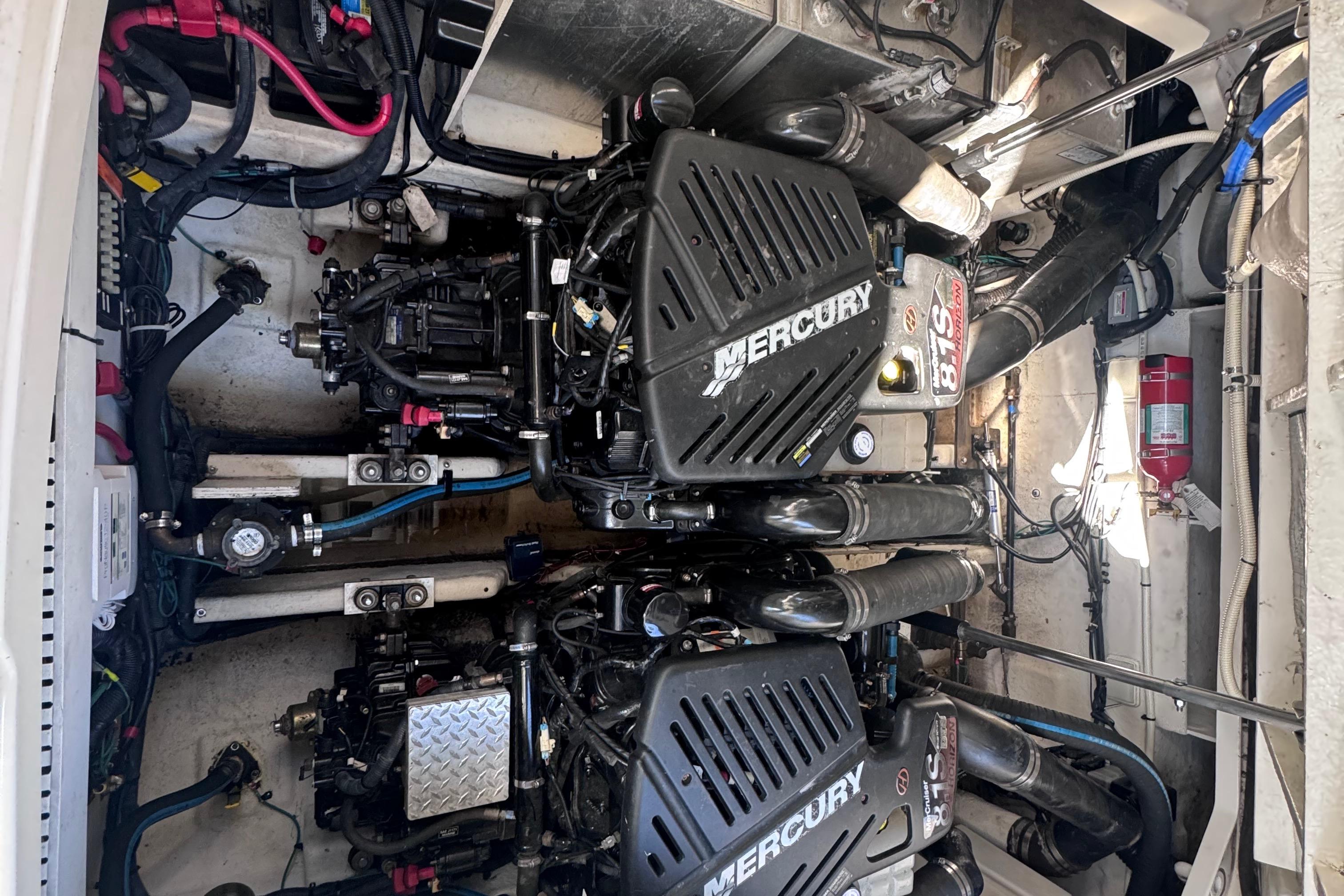 Engine compartment of a 2008 Sea Ray 350 Sundancer with twin Mercury engines.