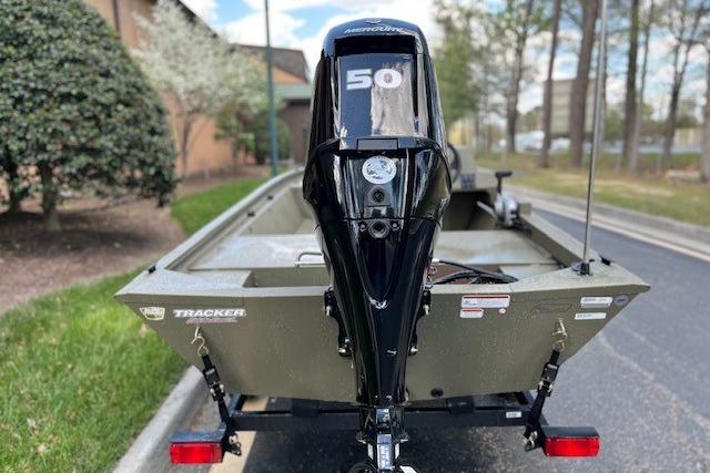 2026 Tracker Grizzly 1648 SC boat with Mercury 50 outboard motor on trailer.