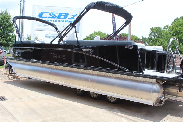 2025 Tahoe Pontoon Cascade Quad Lounger, black exterior, displayed outdoors at a dealership.