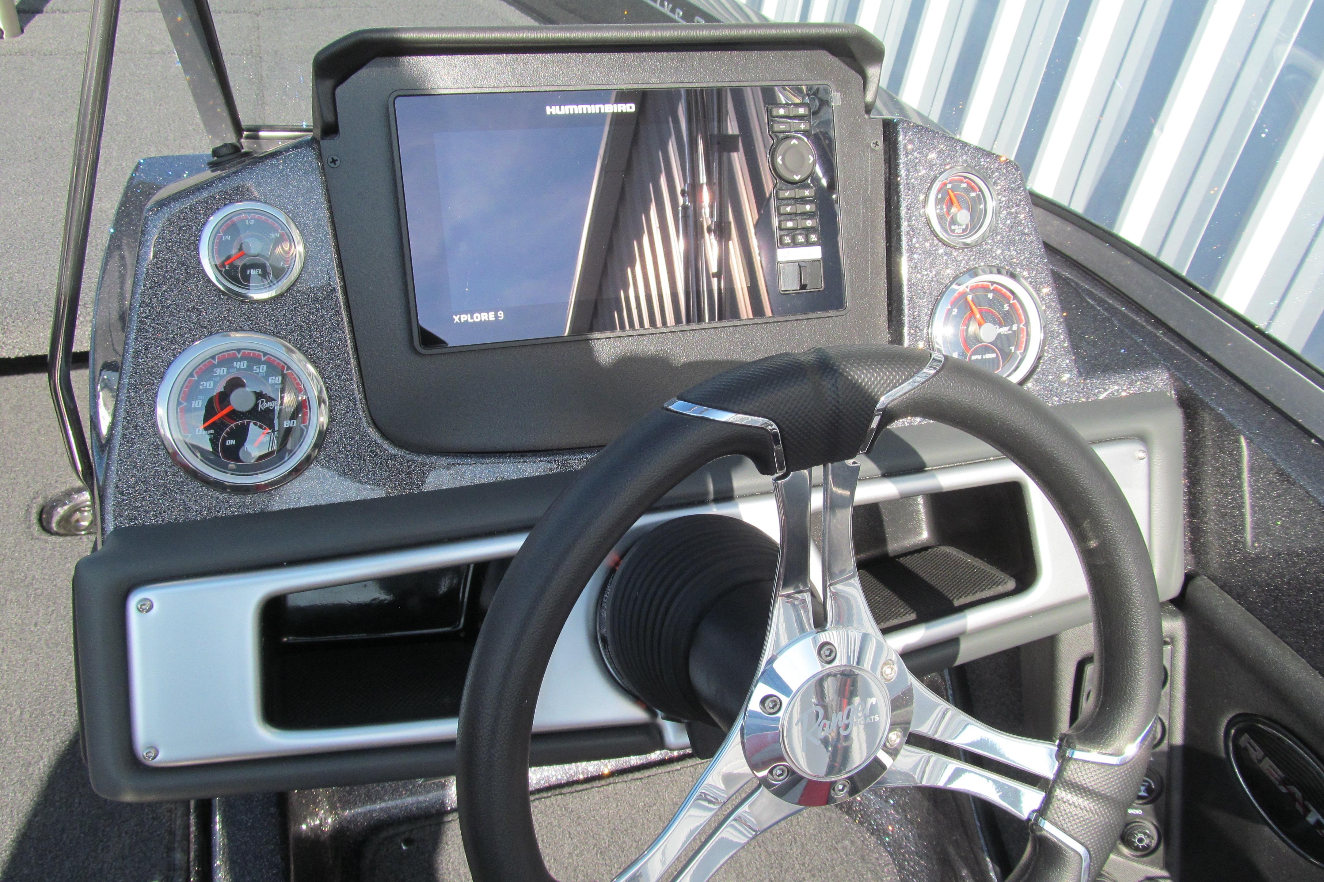 2026 Ranger 212LS boat dashboard with steering wheel and digital display.
