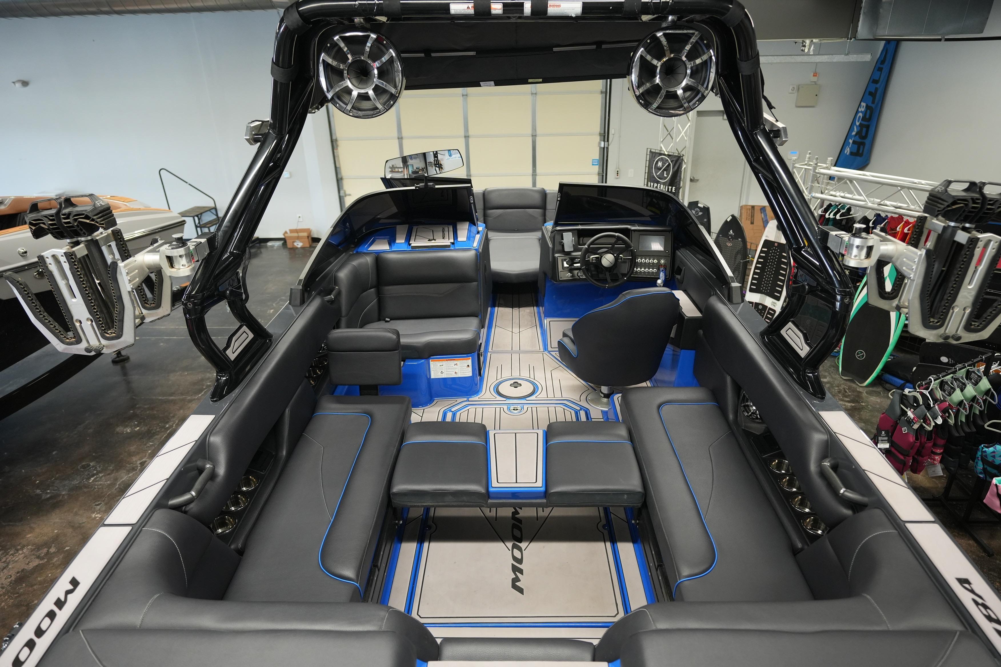 2023 Moomba Mojo boat interior with sleek seating and advanced audio system.