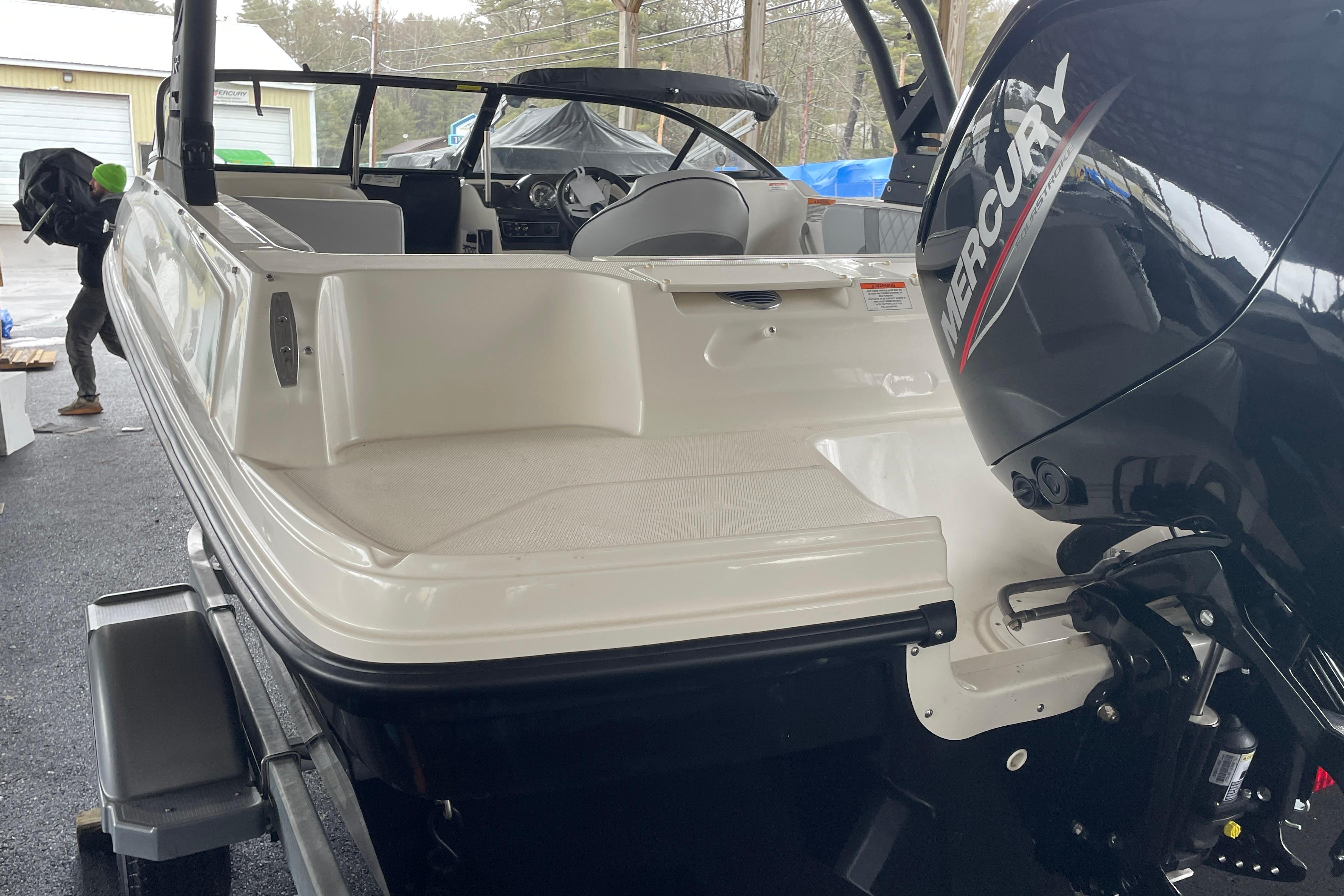 2026 Bayliner VR4 Bowrider OB with Mercury outboard engine, parked on a trailer.
