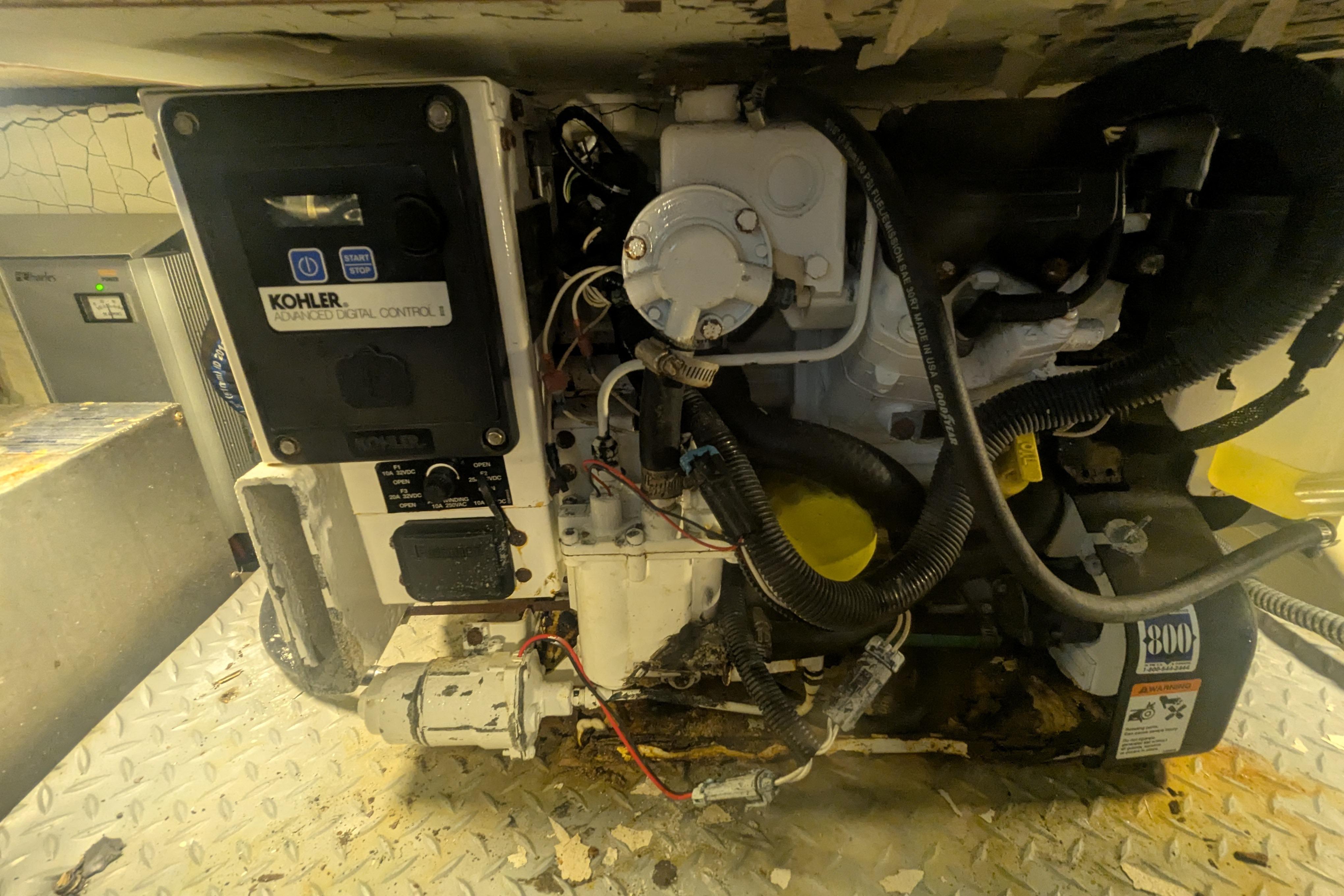 Engine compartment of a 2014 Formula 350 Crossover Bowrider with Kohler digital control panel.