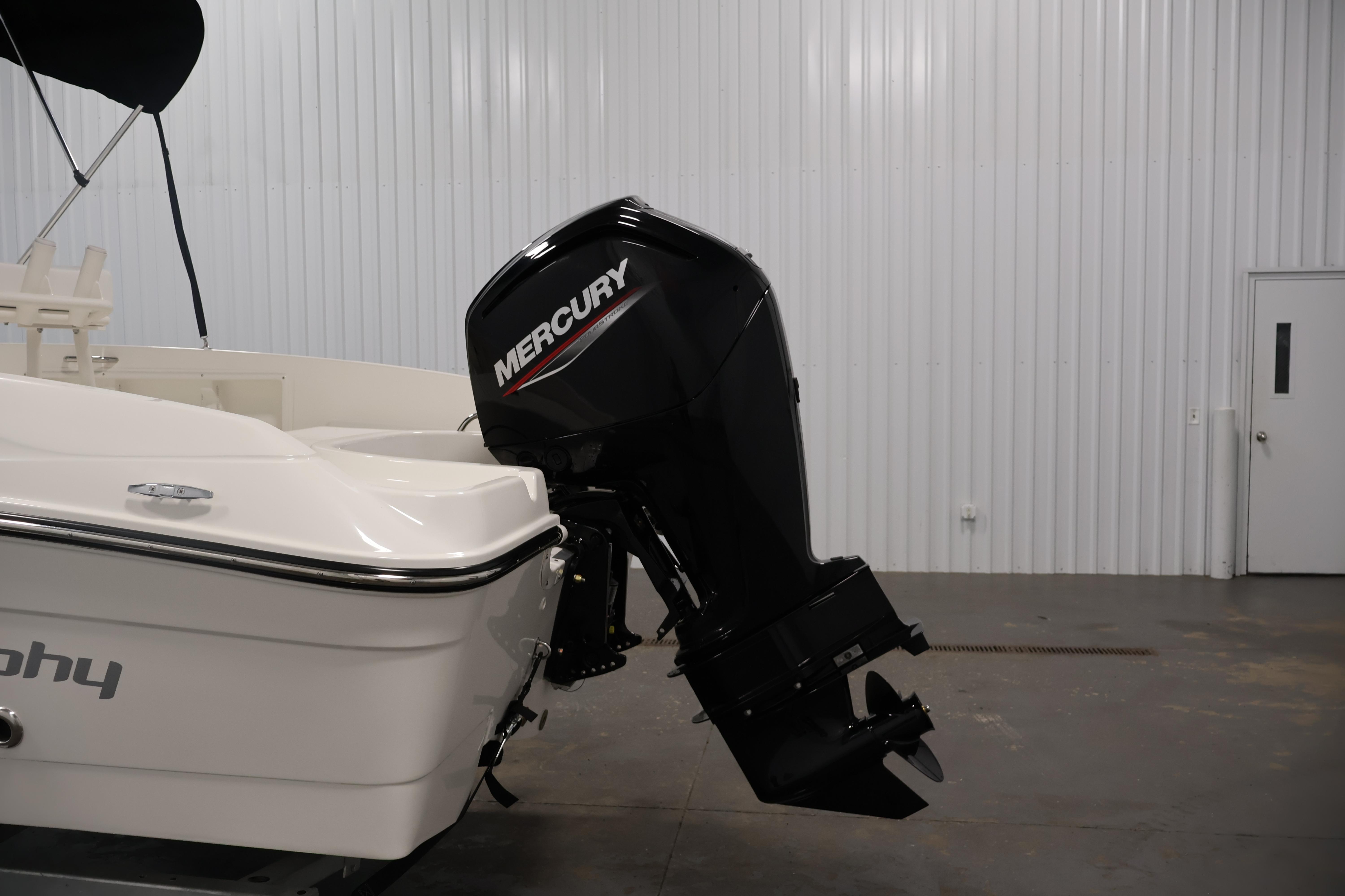 2026 Bayliner Trophy T18 with Mercury outboard motor in a showroom.