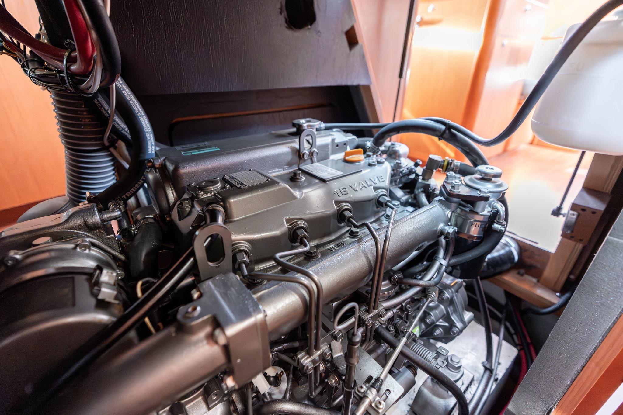 Engine of 2013 Beneteau Oceanis 50 sailboat, showcasing detailed mechanical components.