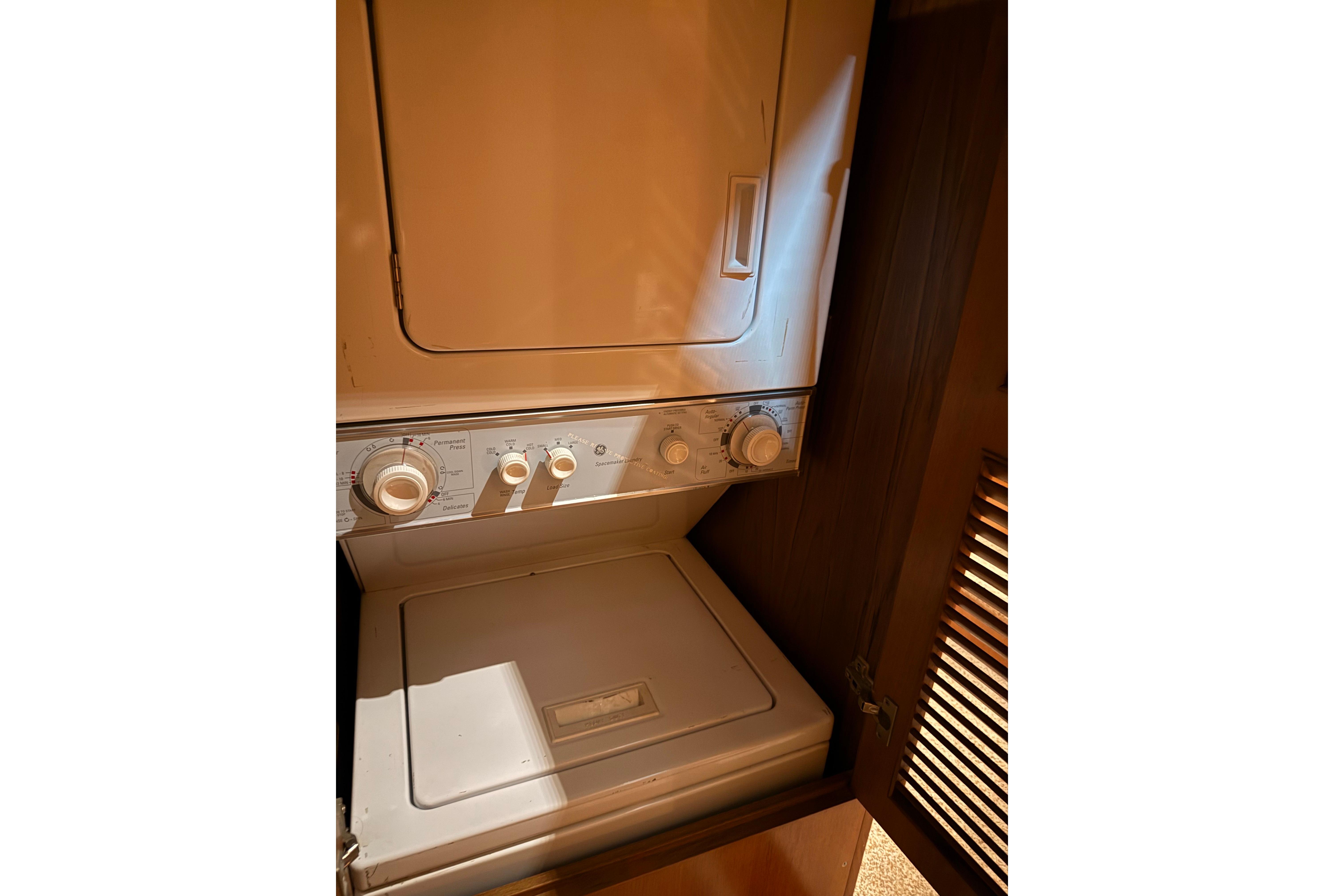 Stacked washer and dryer in 1998 Ocean Alexander Pilothouse Model 584 yacht.