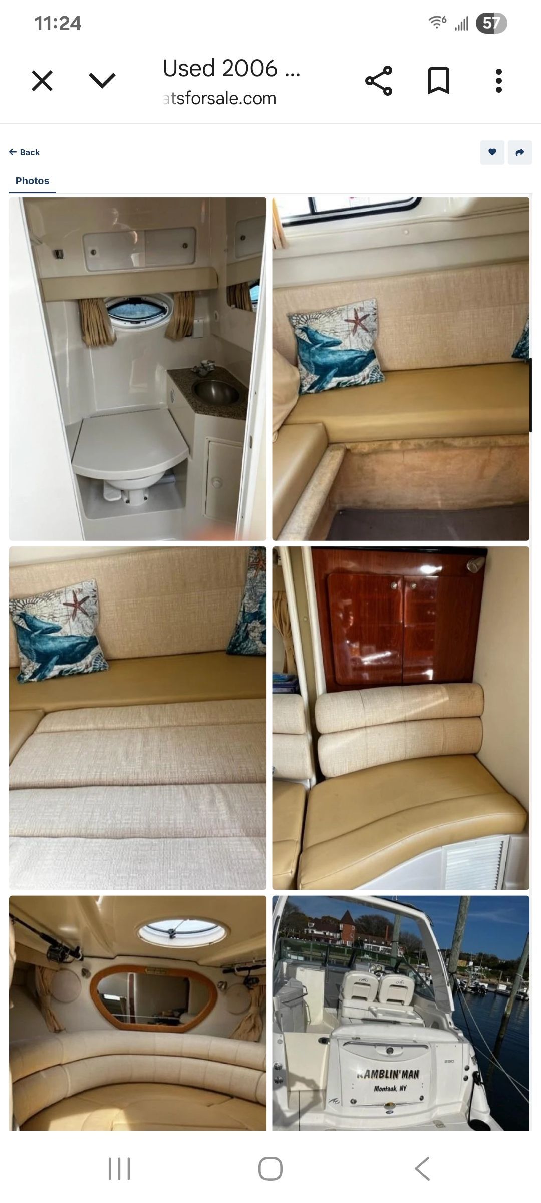 Interior view of a 2006 Monterey 290 Cruiser with seating area and helm.
