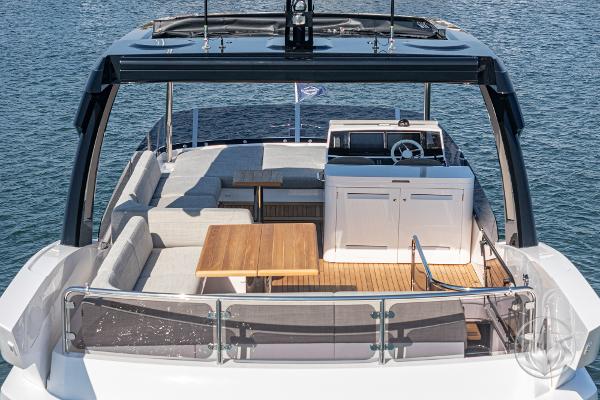 2025 Sunseeker Manhattan 68 yacht with spacious deck and modern seating.