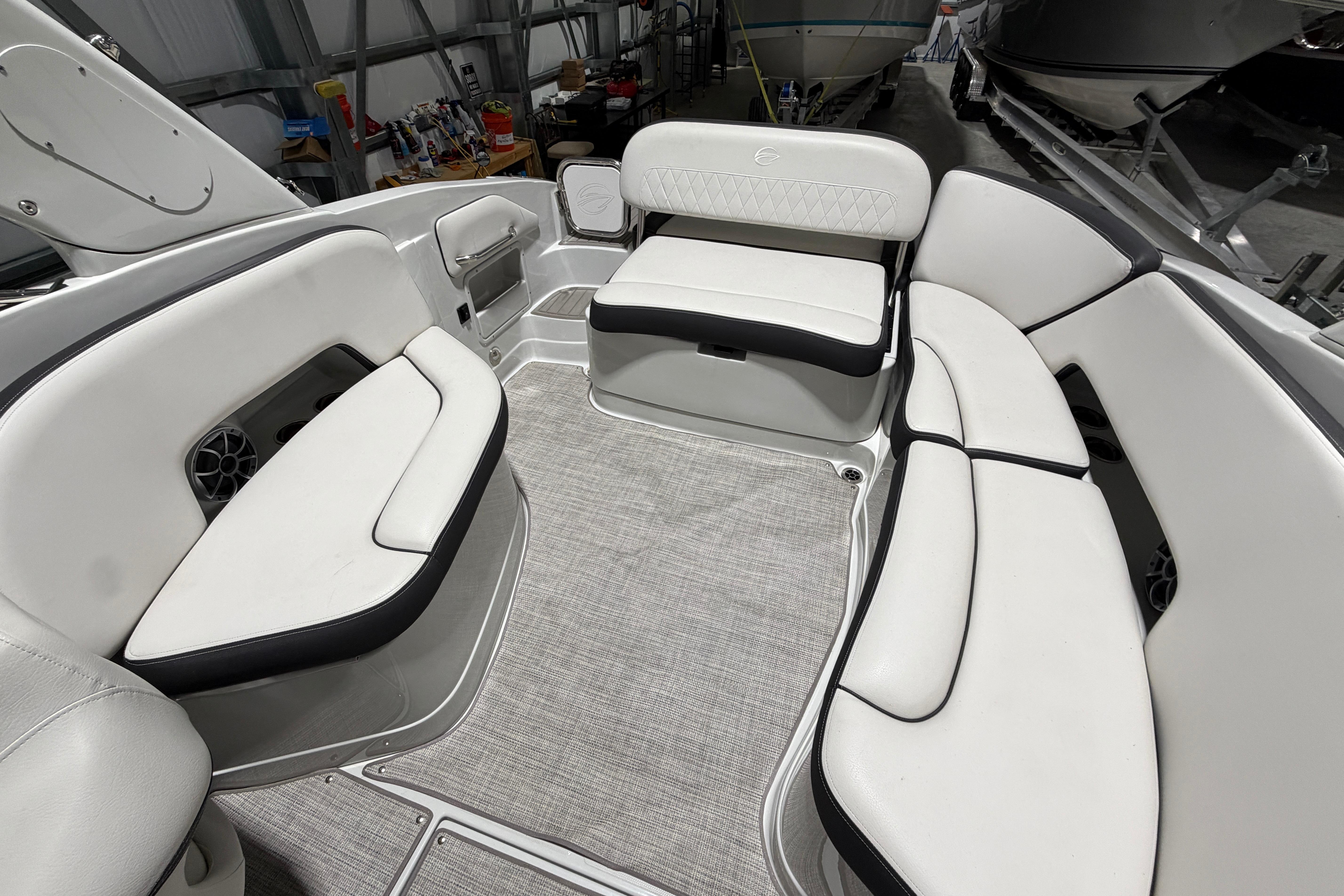 2023 Crownline 280 SS boat interior with white seating and modern design.