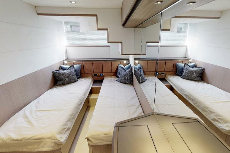 Manufacturer Provided Image: Luxurious cabin interior of 2025 Galeon 650 Sky yacht with twin beds and modern decor.