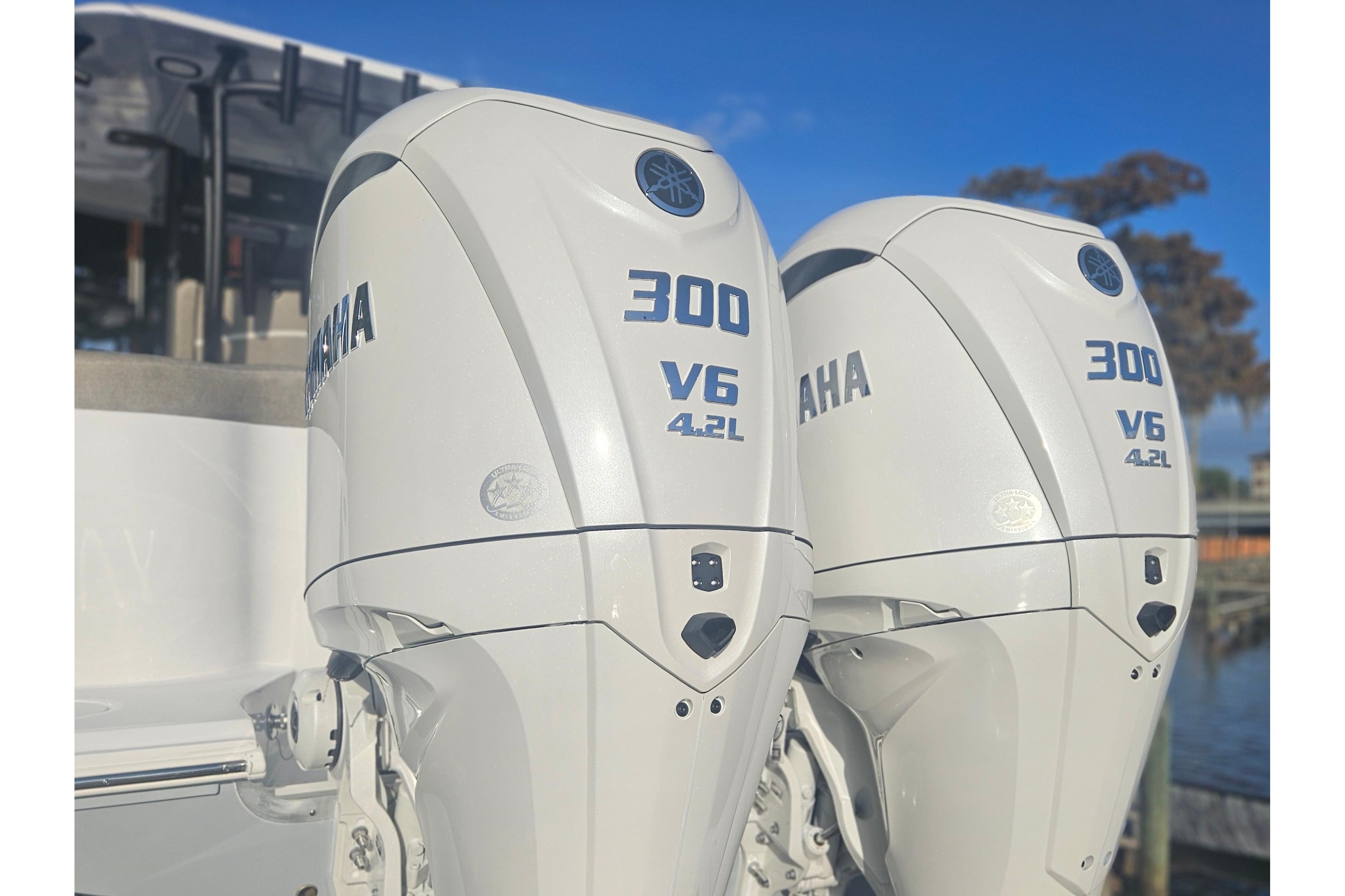 Twin Yamaha 300 V6 outboard engines on a 2026 Sea Hunt Ultra 285 SE boat.