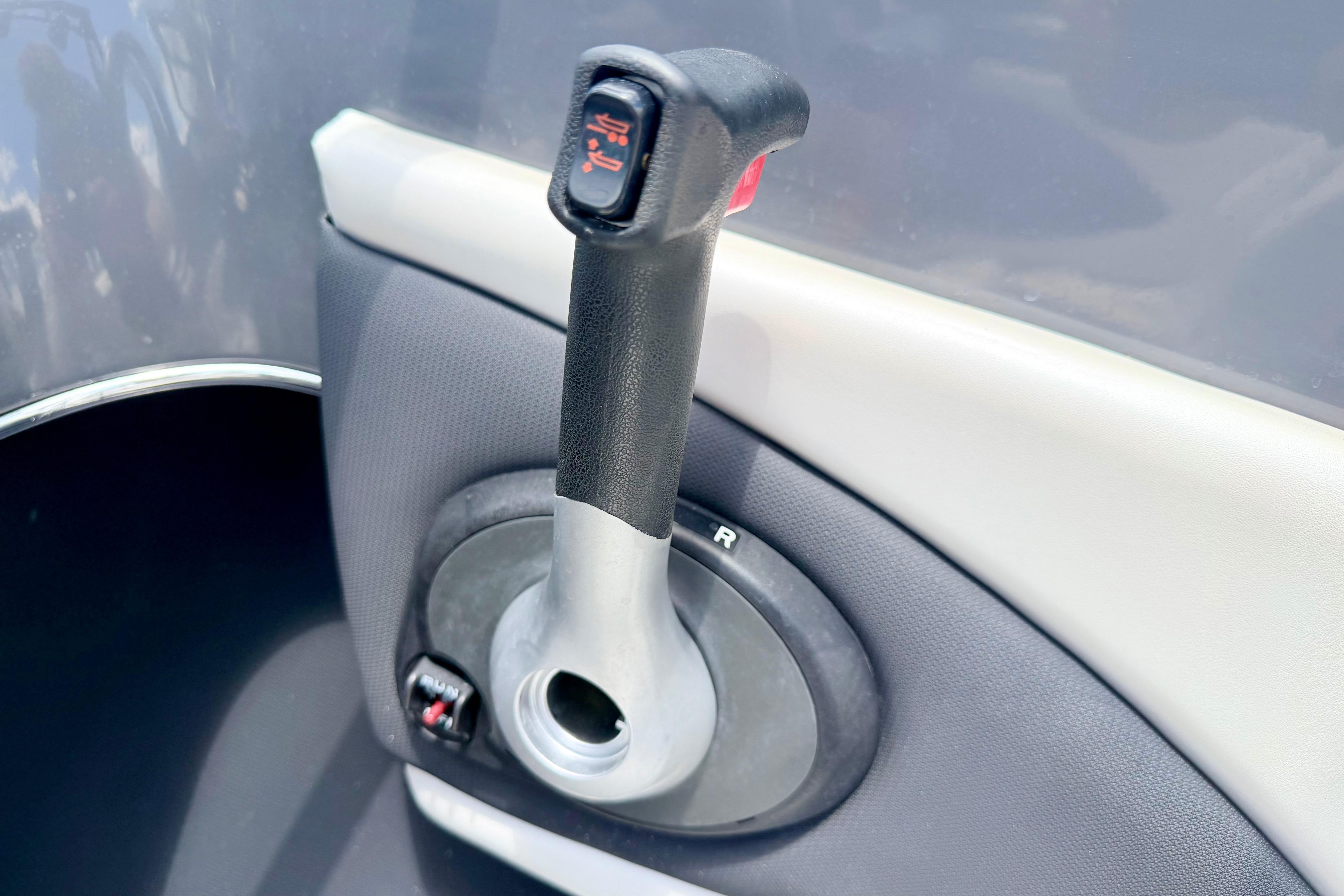 Throttle control lever of a 2018 Glastron GT 185 boat.