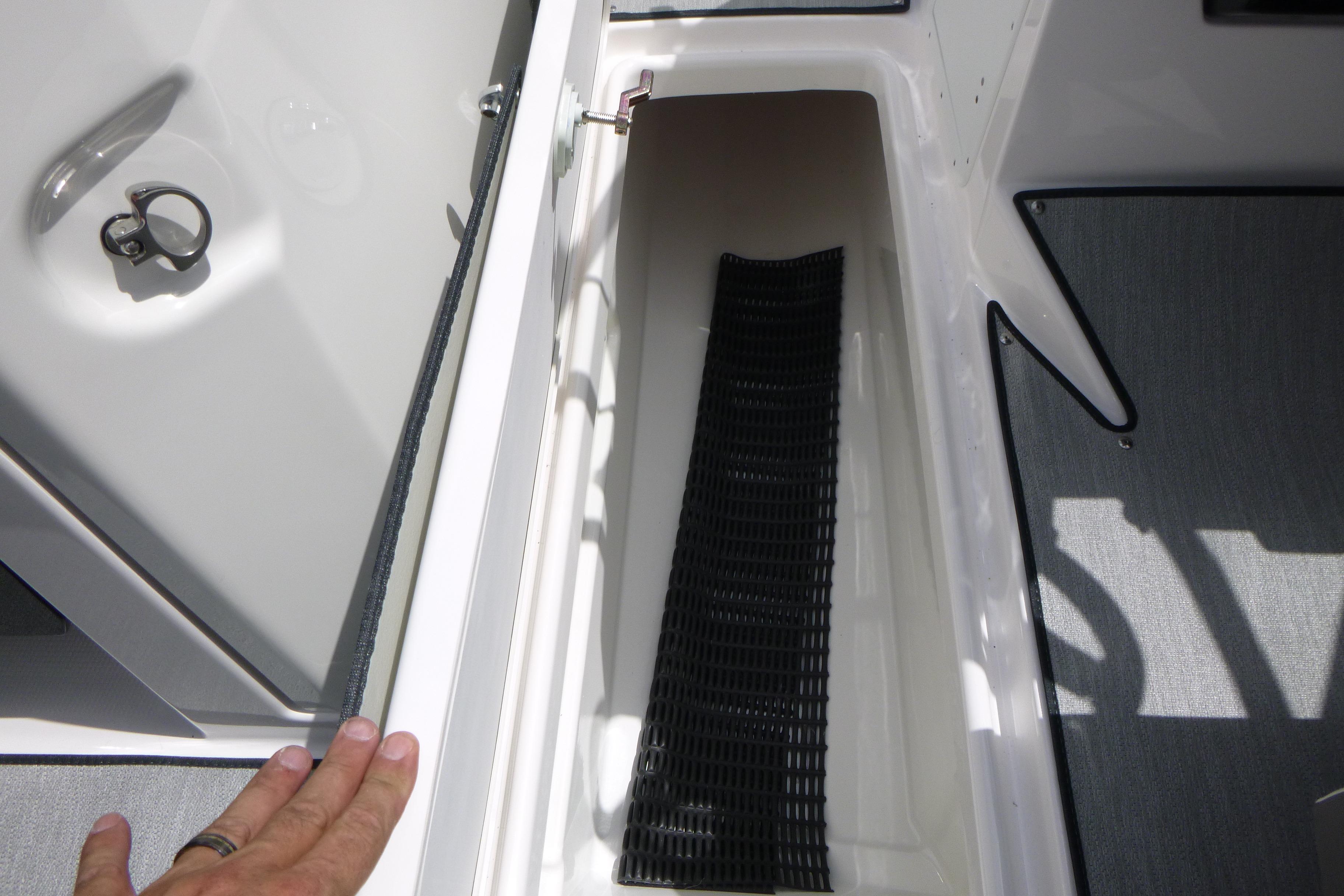 Storage compartment in 2026 Yamaha Boats AR250, featuring sleek design and practical functionality.