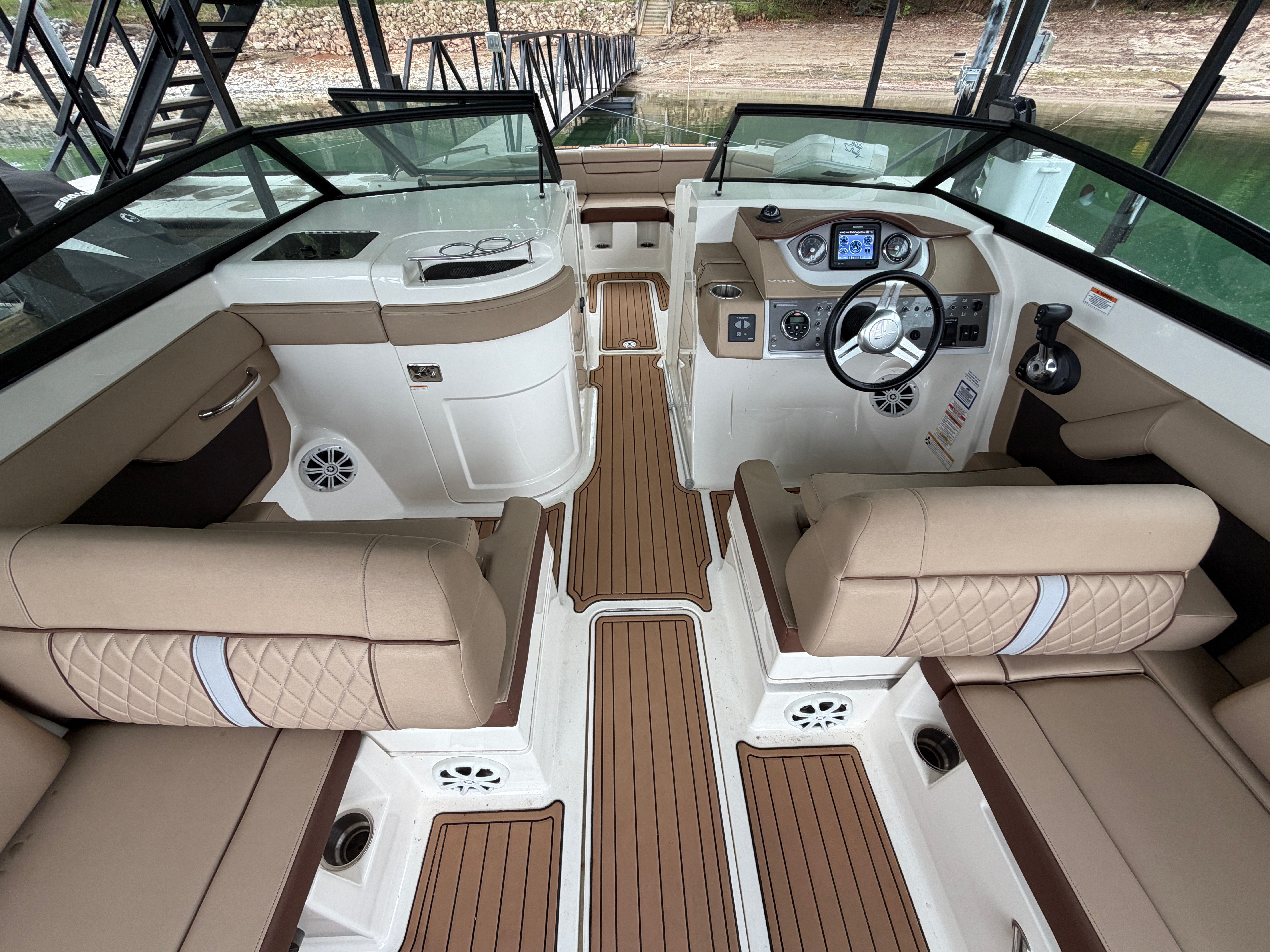 Interior of 2016 Sea Ray 290 Sundeck with elegant seating.
