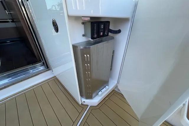 2016 Sea Ray Sundancer 510 yacht interior detail with control panel and sleek flooring.