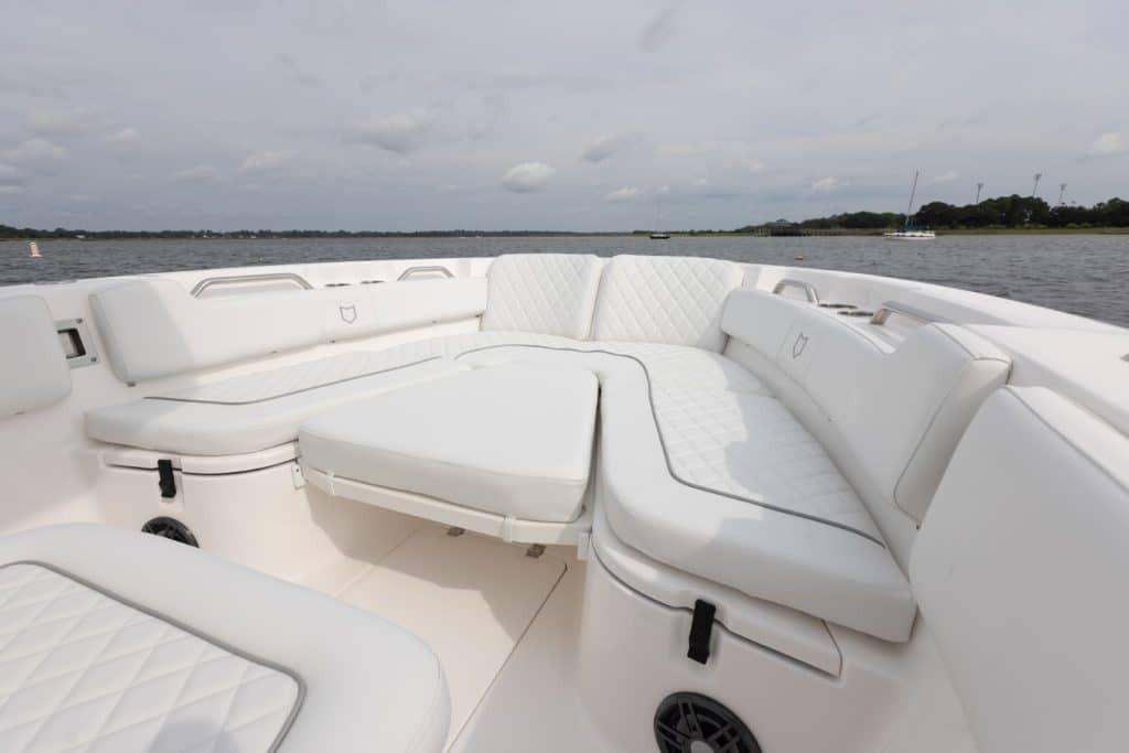 Luxurious seating on 2027 Sea Fox 248 Commander boat, featuring elegant white upholstery.