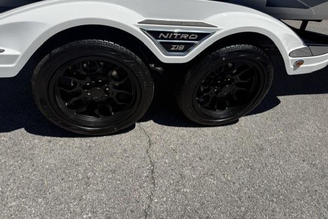 2026 Nitro Z19 XL Pro trailer with sleek black wheels on pavement.