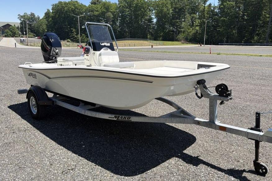 2026 Mako Pro Skiff 15 CC boat on trailer in outdoor setting.