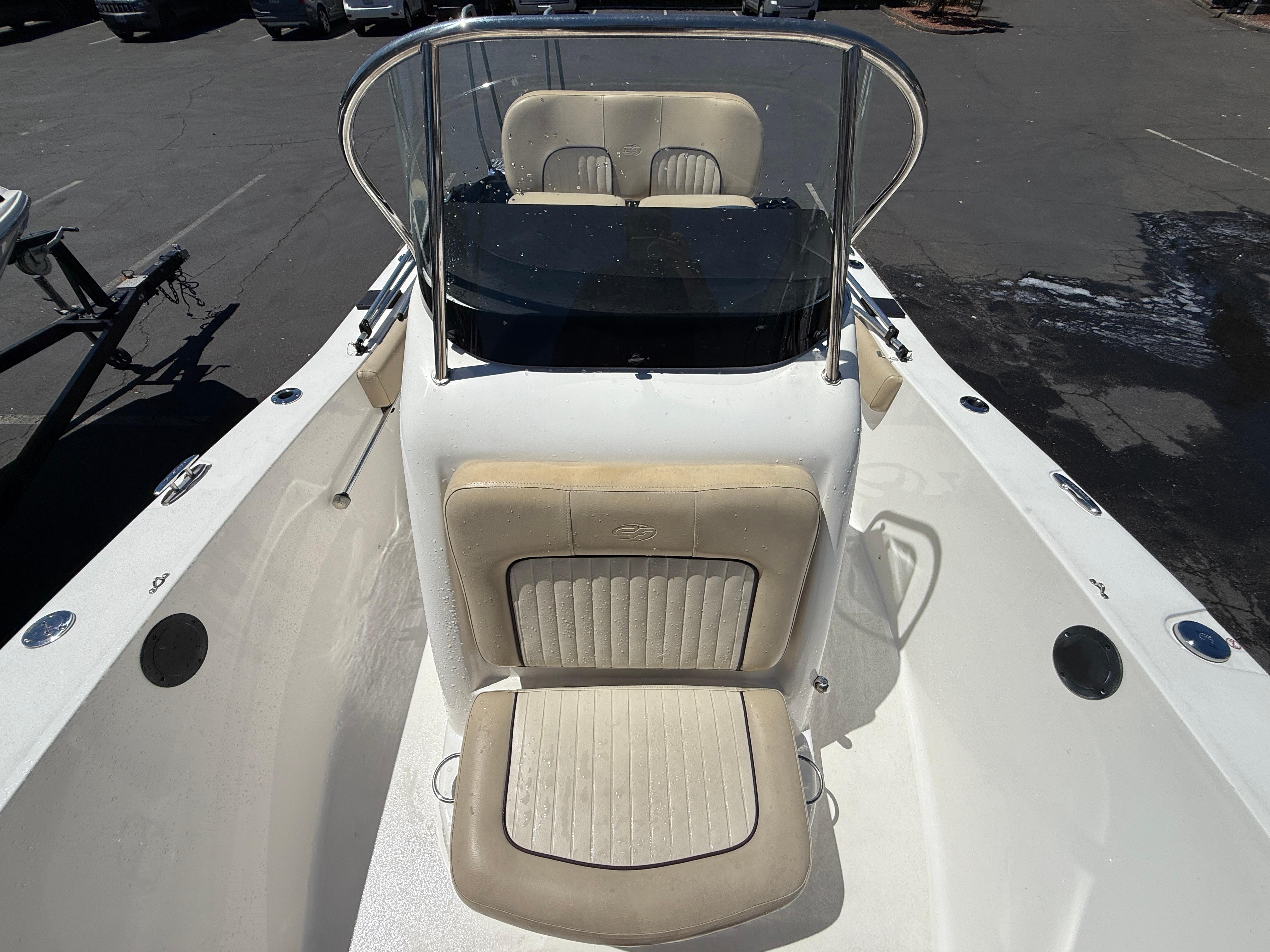 2018 Sea Fox 186 Commander boat interior with beige seating and windshield.