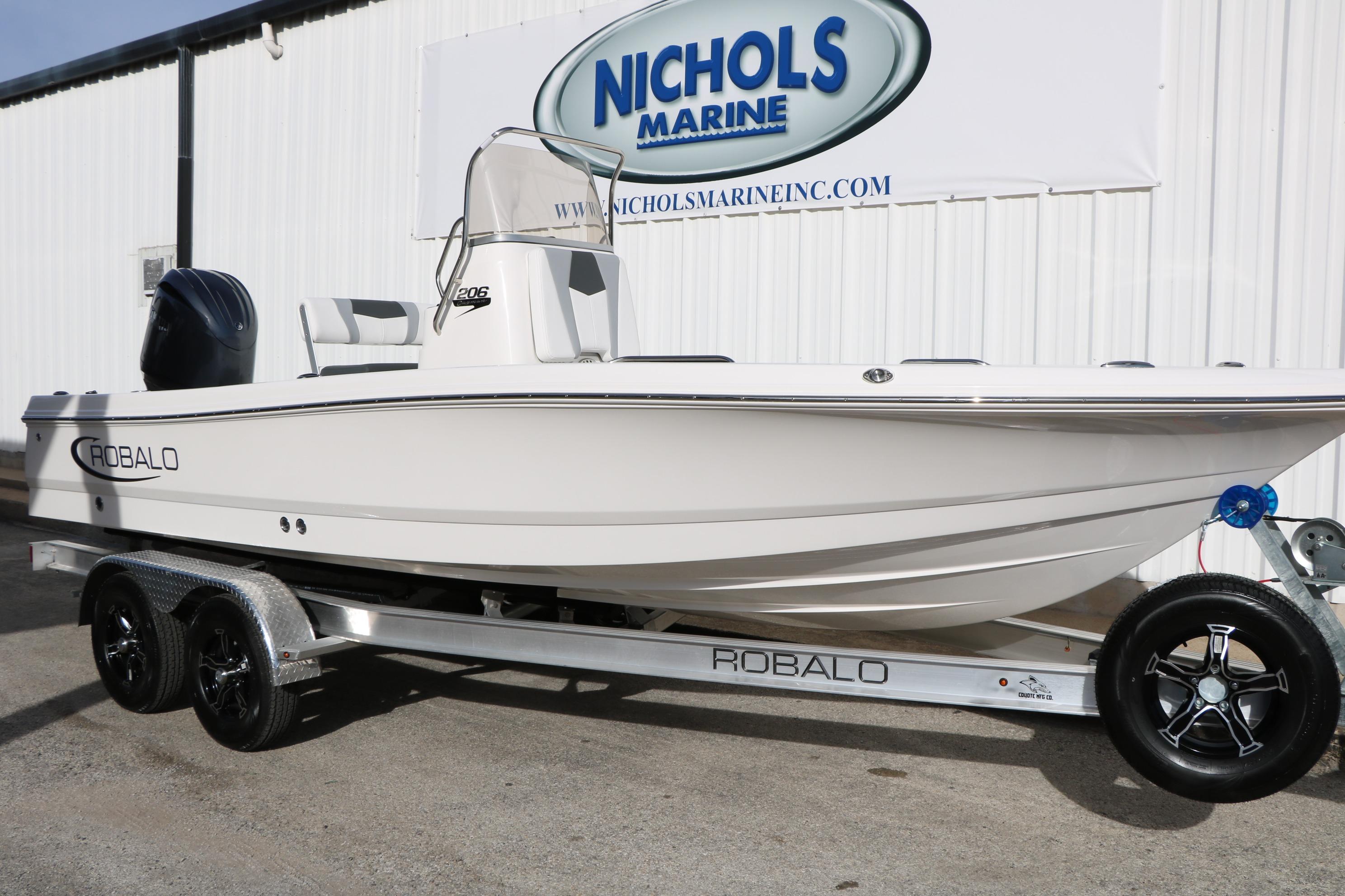 2026 Robalo 206 Cayman boat on trailer at Nichols Marine dealership.
