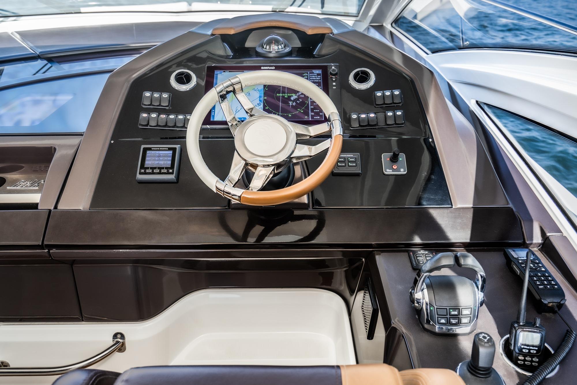 Helm of 2017 Beneteau Gran Turismo 46 yacht with modern navigation controls.