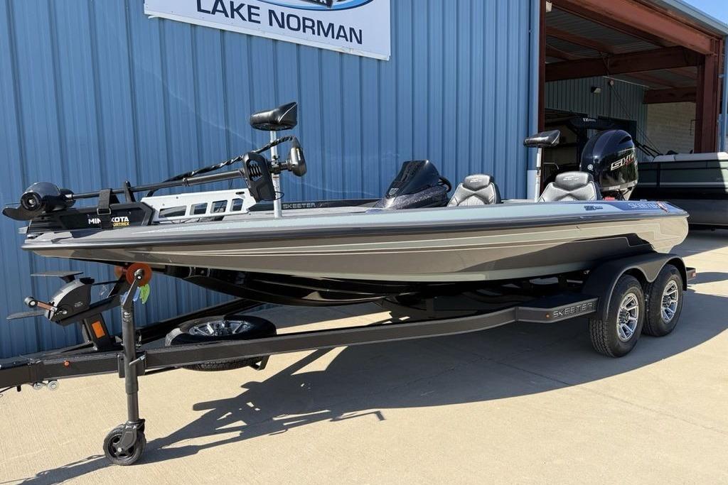 2026 Skeeter ZX150 boat on trailer at Lake Norman dealership.