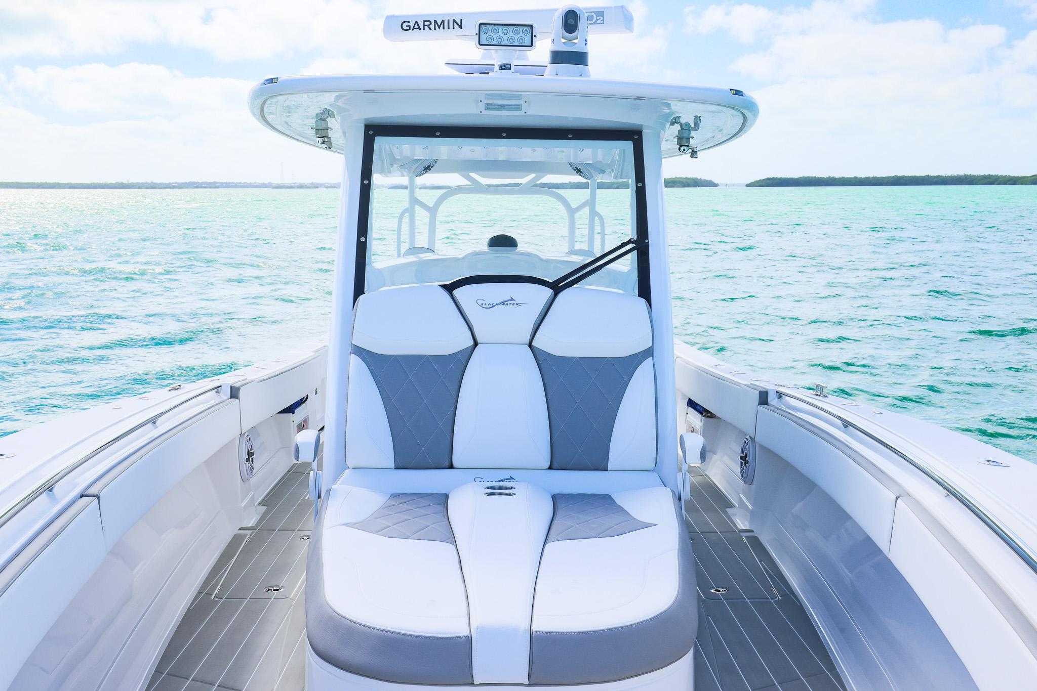 2025 Blackwater 43 Sportfish boat interior with luxurious seating on open water.