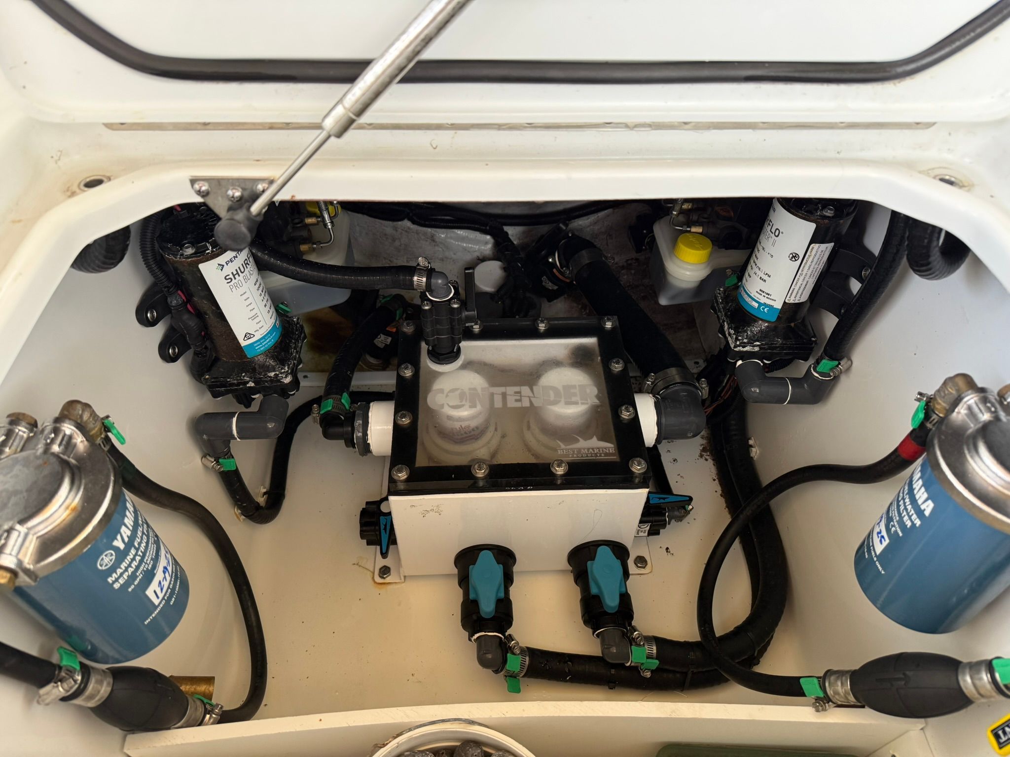 Engine compartment of 2025 Contender 32 ST with technical components.