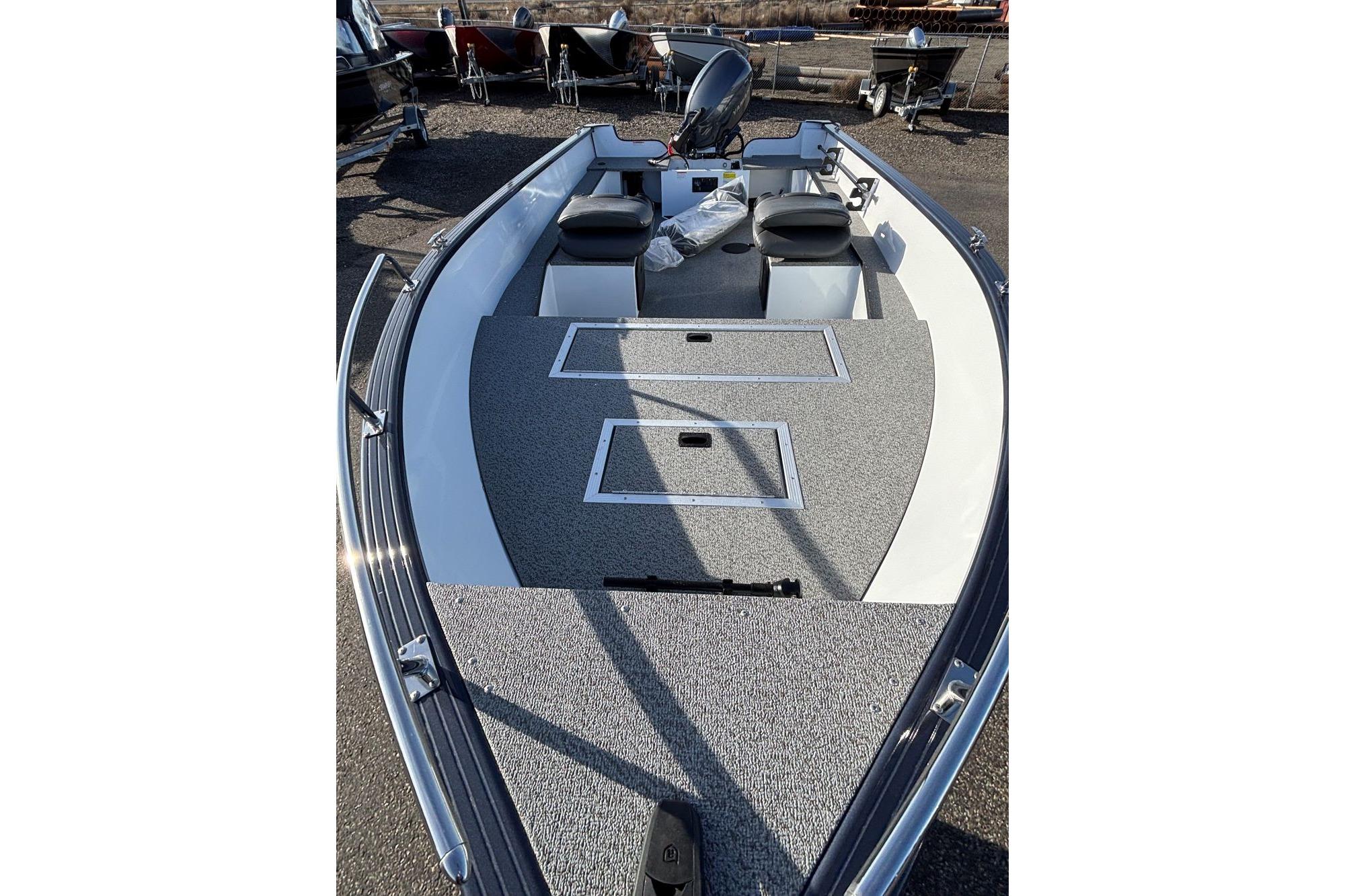 2026 Smoker Craft Pro Lodge 160 boat with spacious deck and seating.