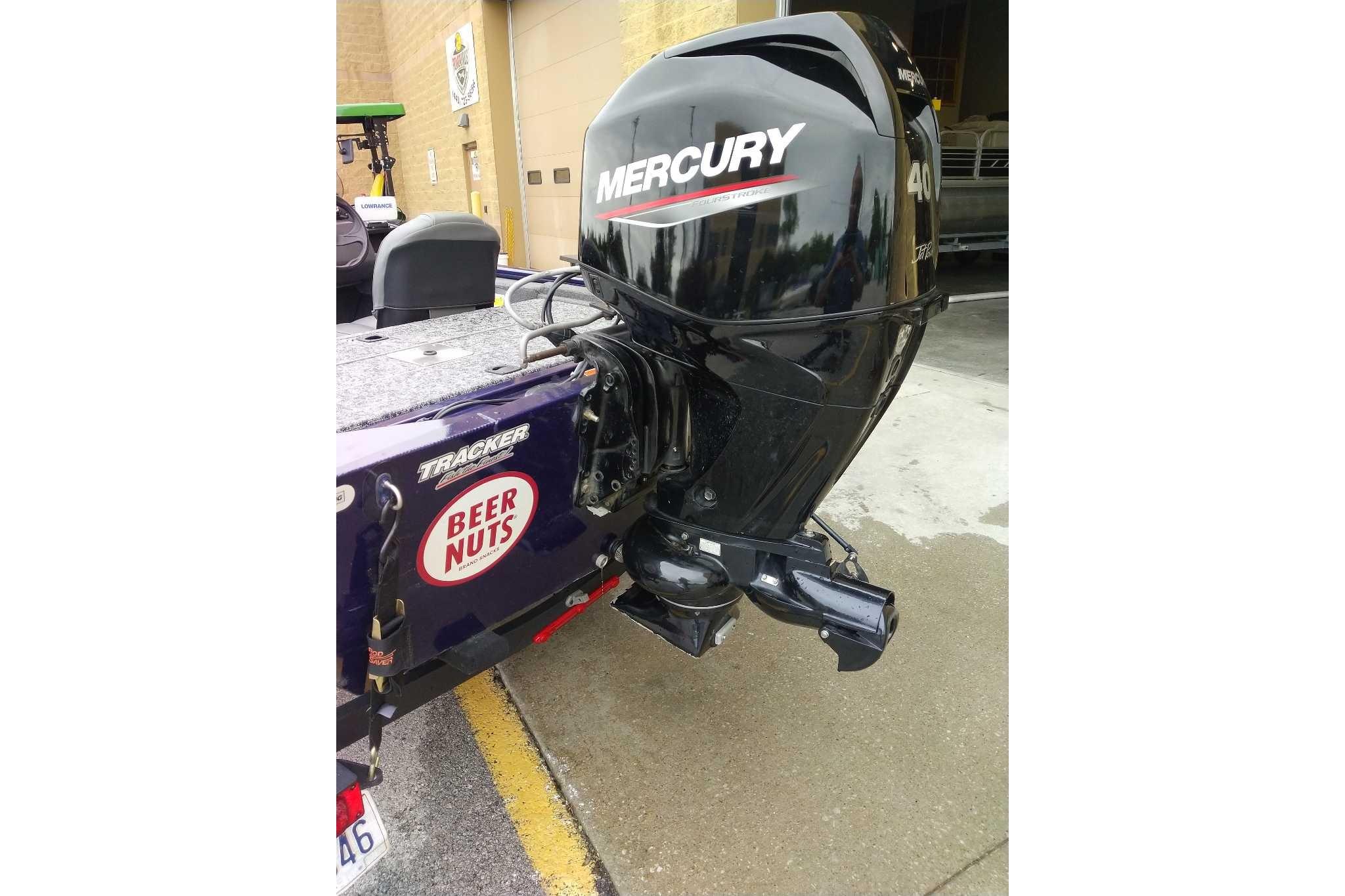 2020 Tracker Pro 170 boat with Mercury 40 HP outboard motor, parked outdoors.