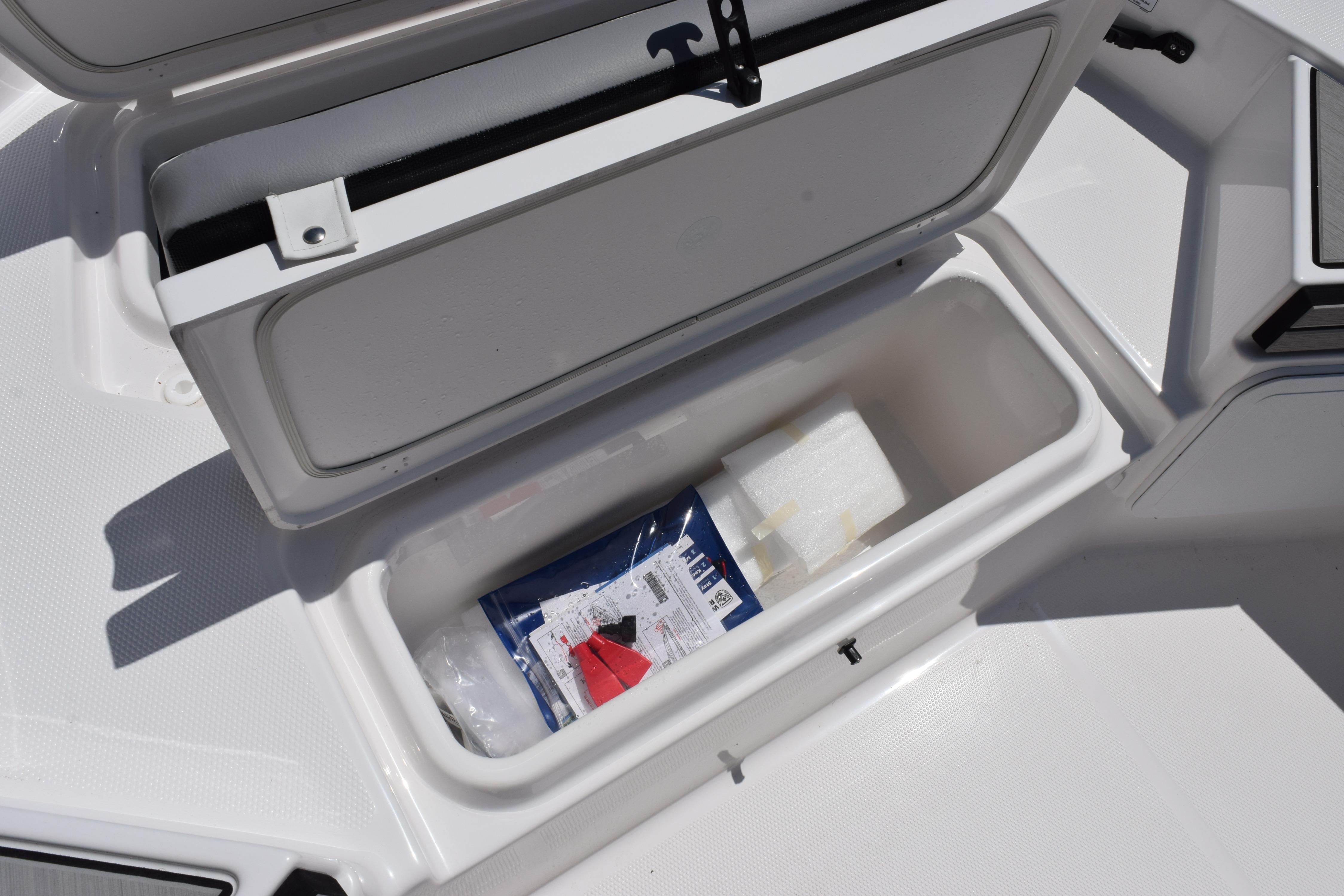 Storage compartment on 2026 Yamaha Boats 190 FSH Sport, featuring organized interior space.