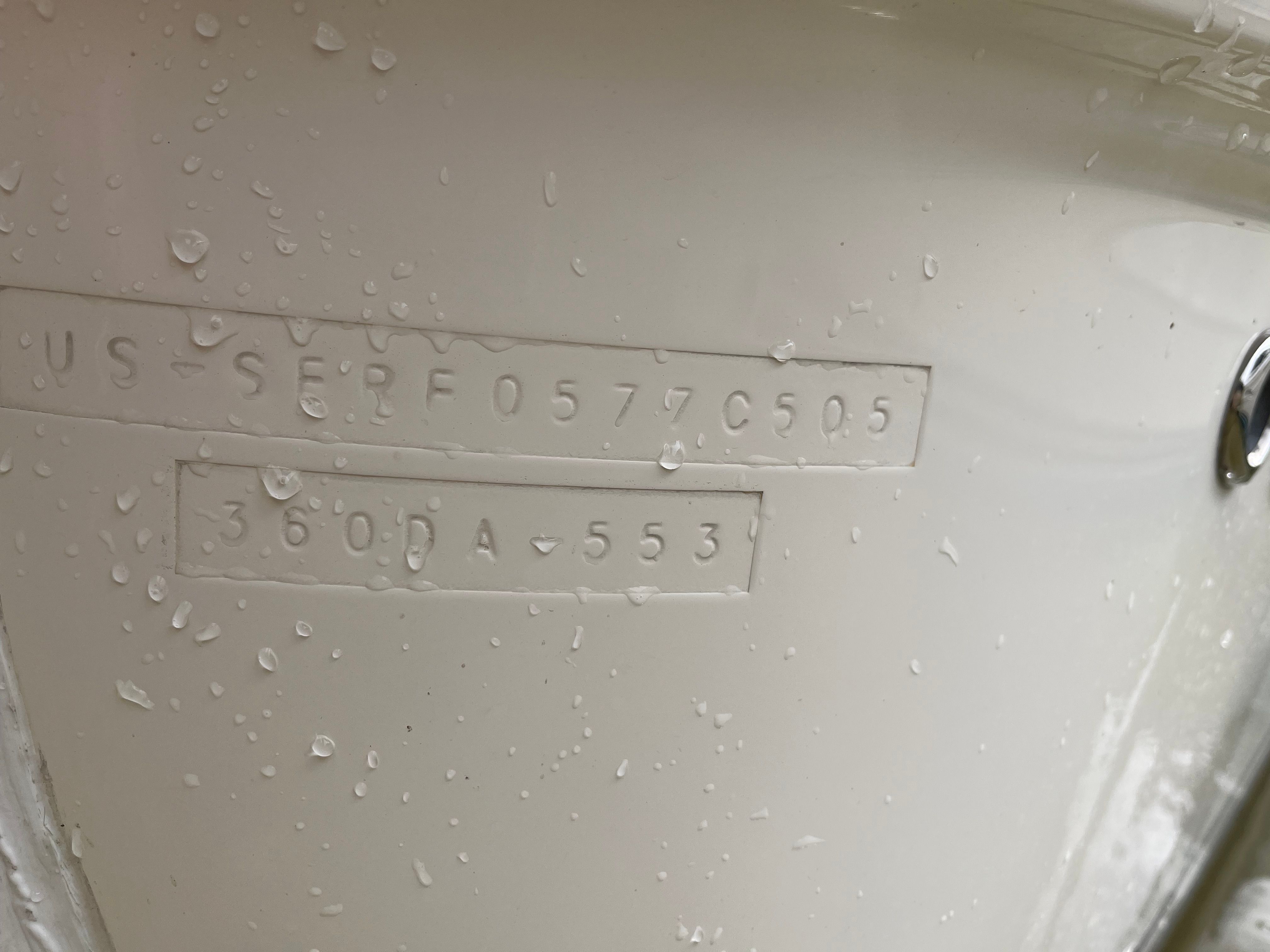 Serial number on Sea Ray Sundancer 2005 boat hull.