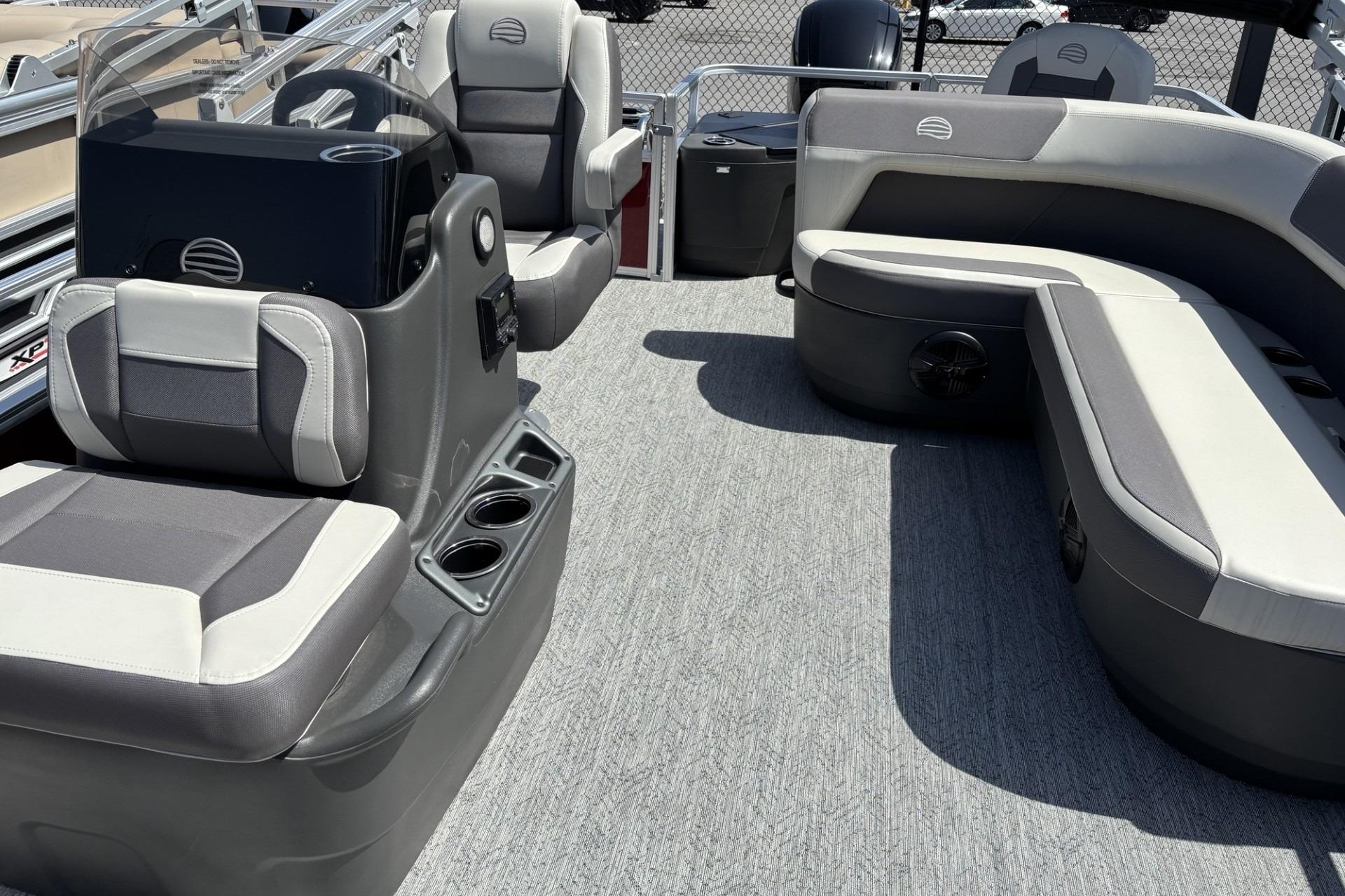 2026 Sun Tracker Bass Buggy 18 DLX interior with seating and steering console.