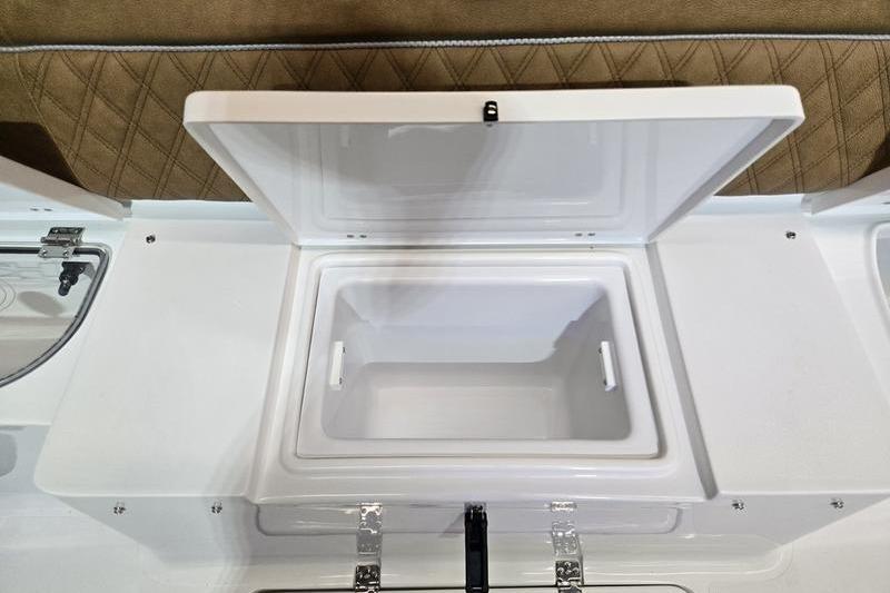 2026 Sea Hunt Ultra 275 Coffin Box with open storage compartment.