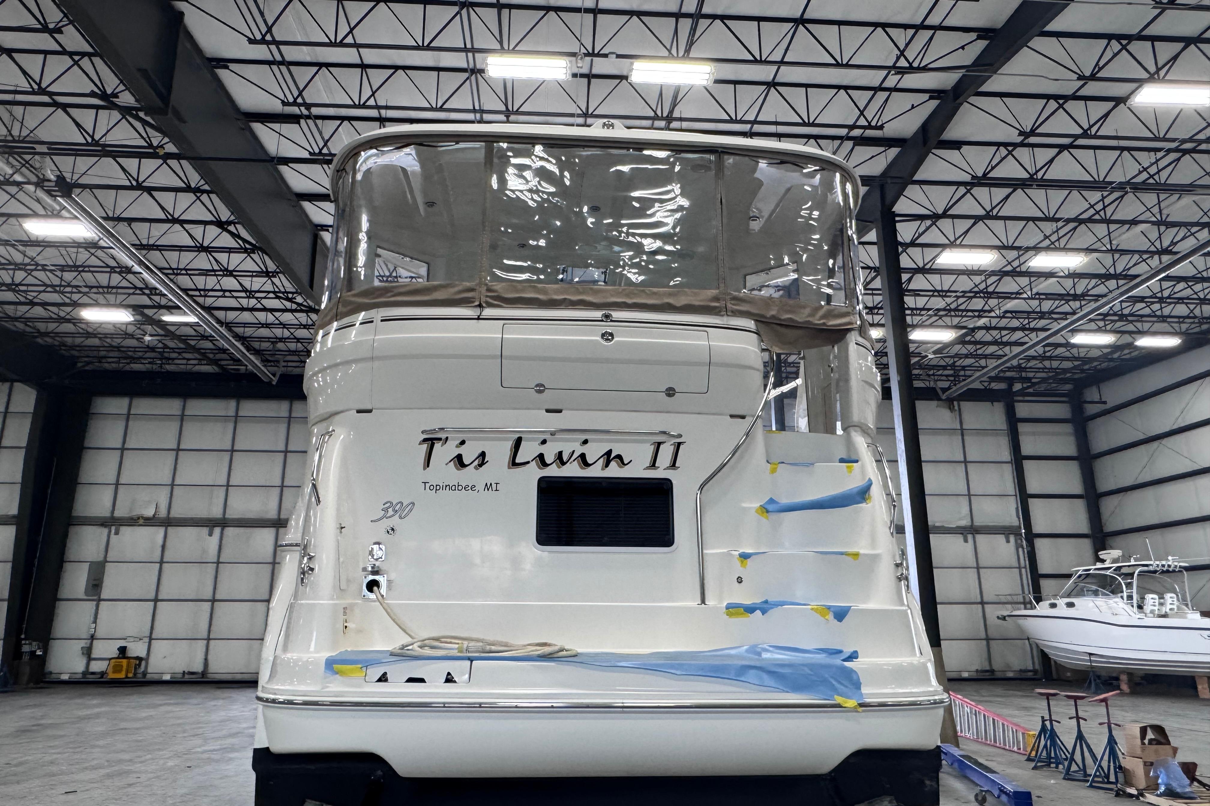 2004 Sea Ray 390 Motor Yacht in indoor storage, rear view.