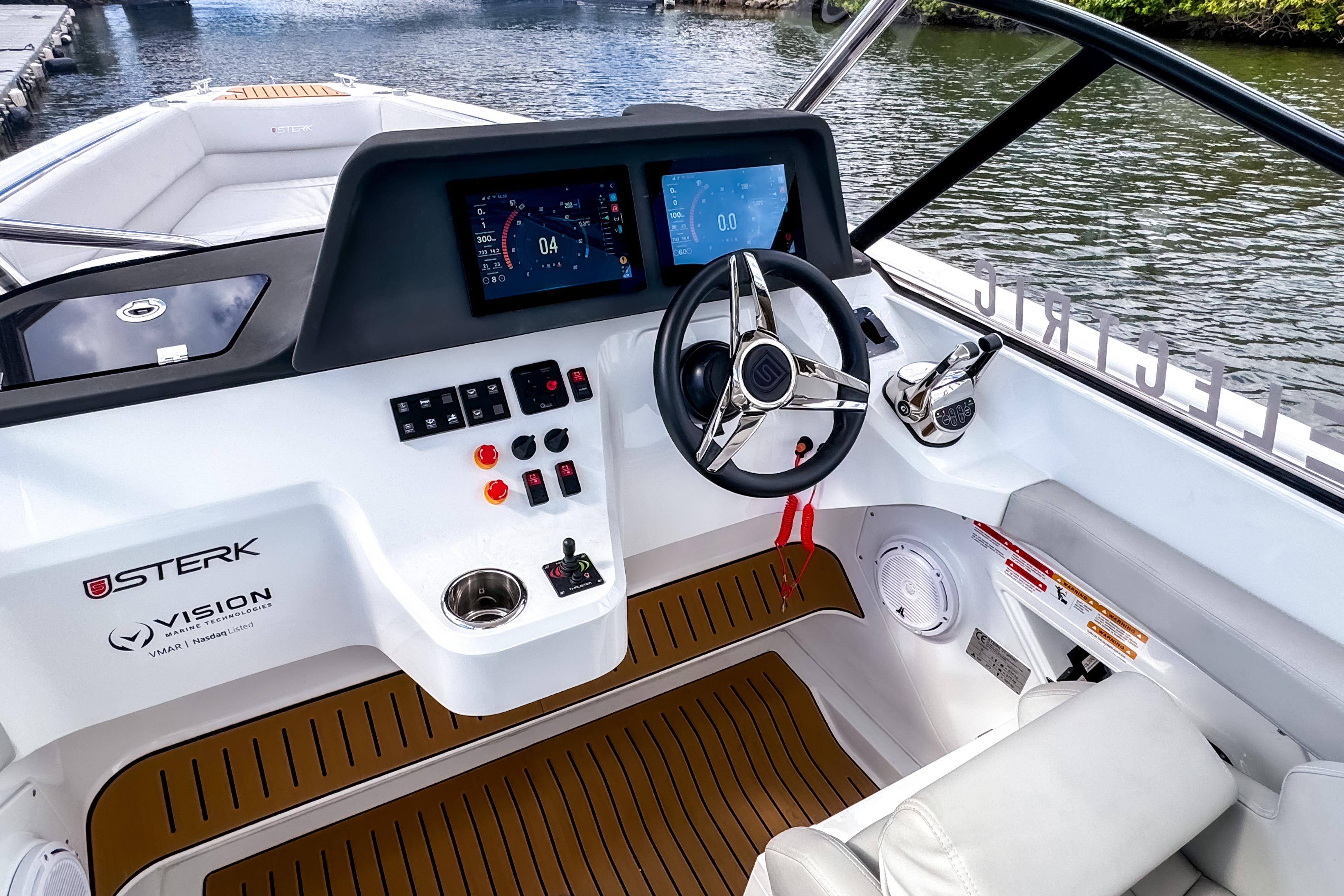Modern STERK 31 boat cockpit with advanced controls and digital displays, 2025 model.