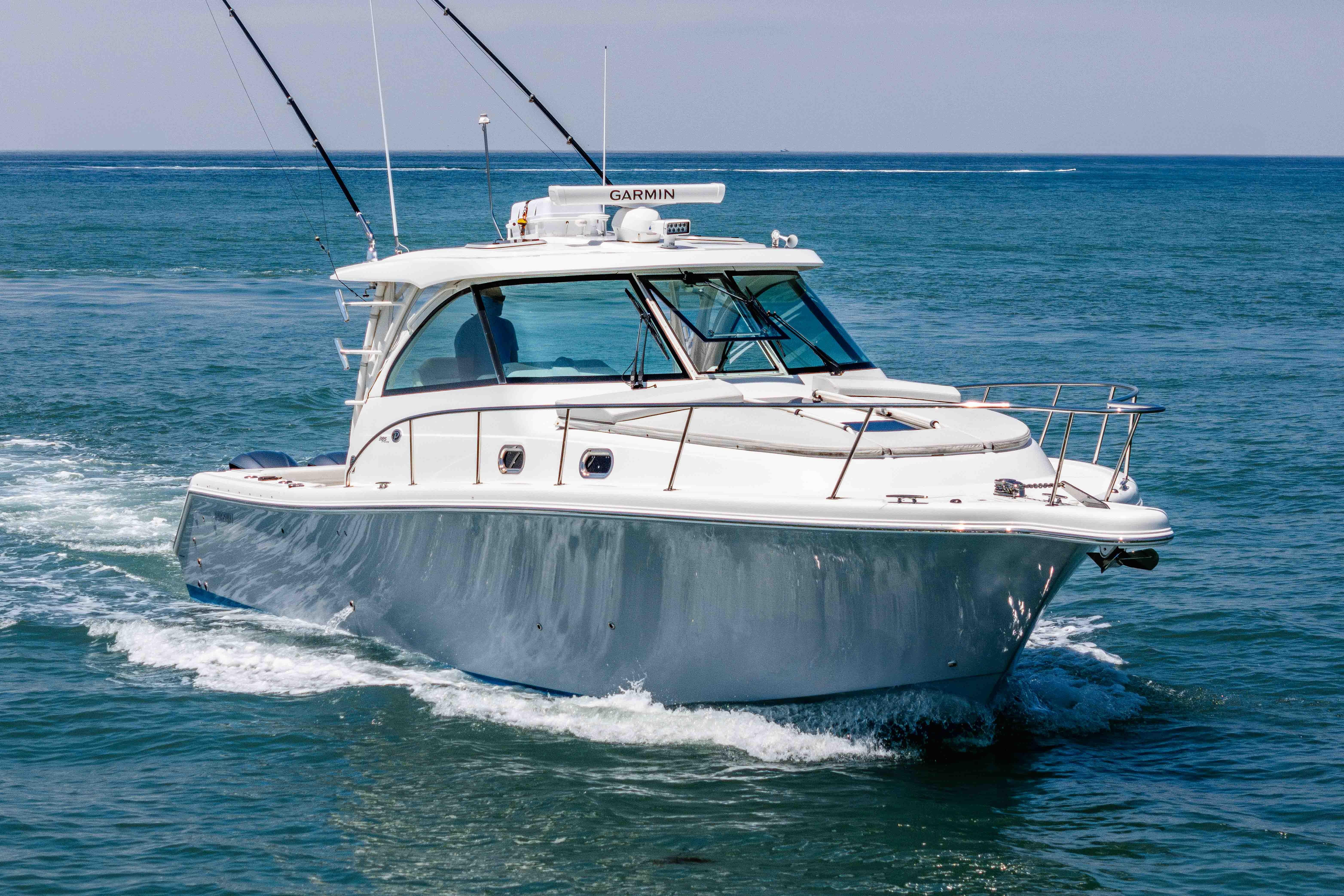 2022 Pursuit OS 385 Offshore boat cruising on open water.