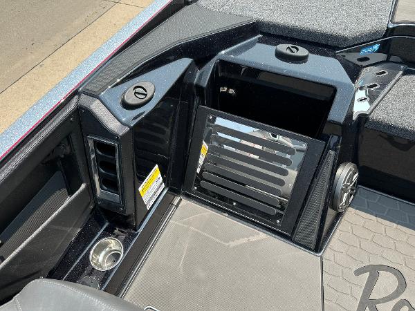 2025 Ranger Z520R Cup-Equipped boat interior with storage compartments and cup holder.