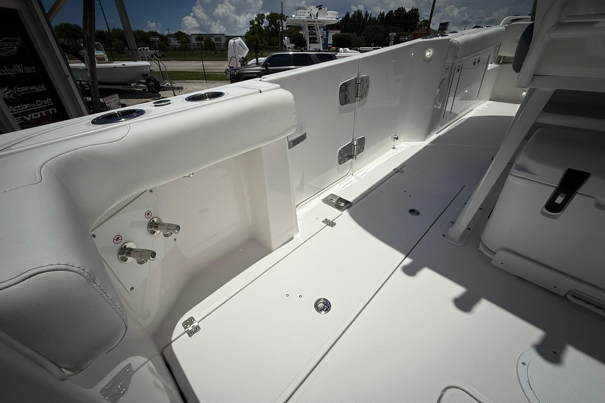 2026 Edgewater 250CC boat interior, showcasing sleek white design and modern fittings.