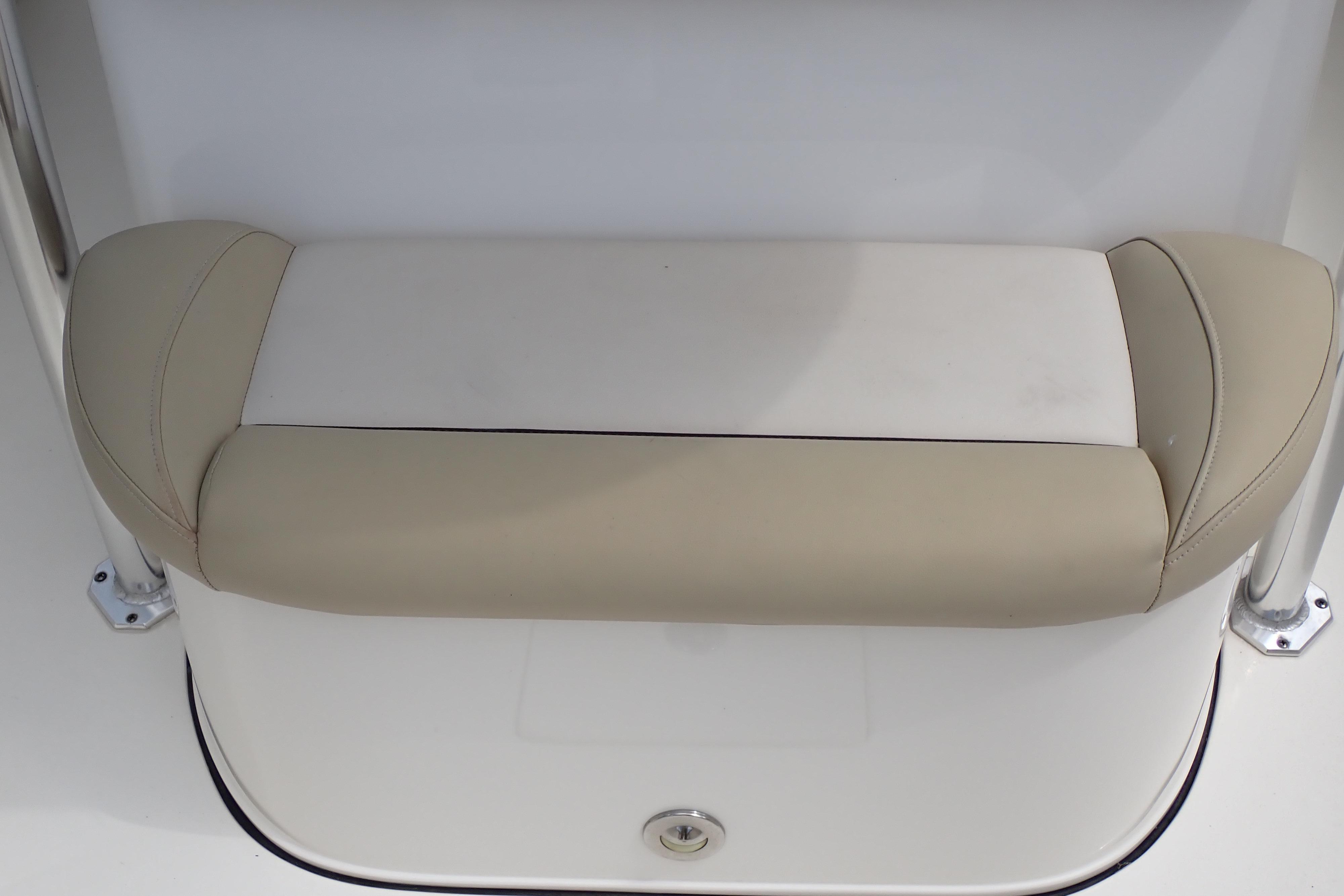 2019 Key West 263 FS boat seat with beige and white upholstery.
