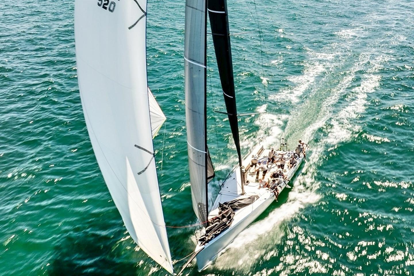 Sailing yacht Judel and Vrolijk TP 52, 2015 model, gliding on open sea.