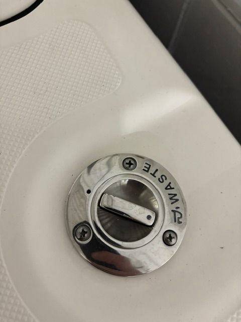 Waste tank cap on Pursuit C 238 Center Console 2022.