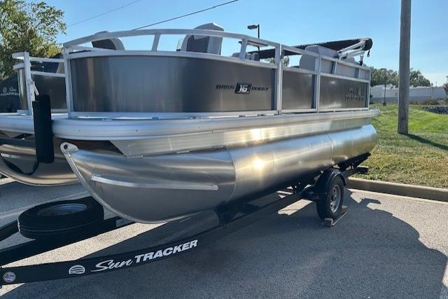 2026 Sun Tracker Bass Buggy 16 XL Select pontoon boat on trailer.