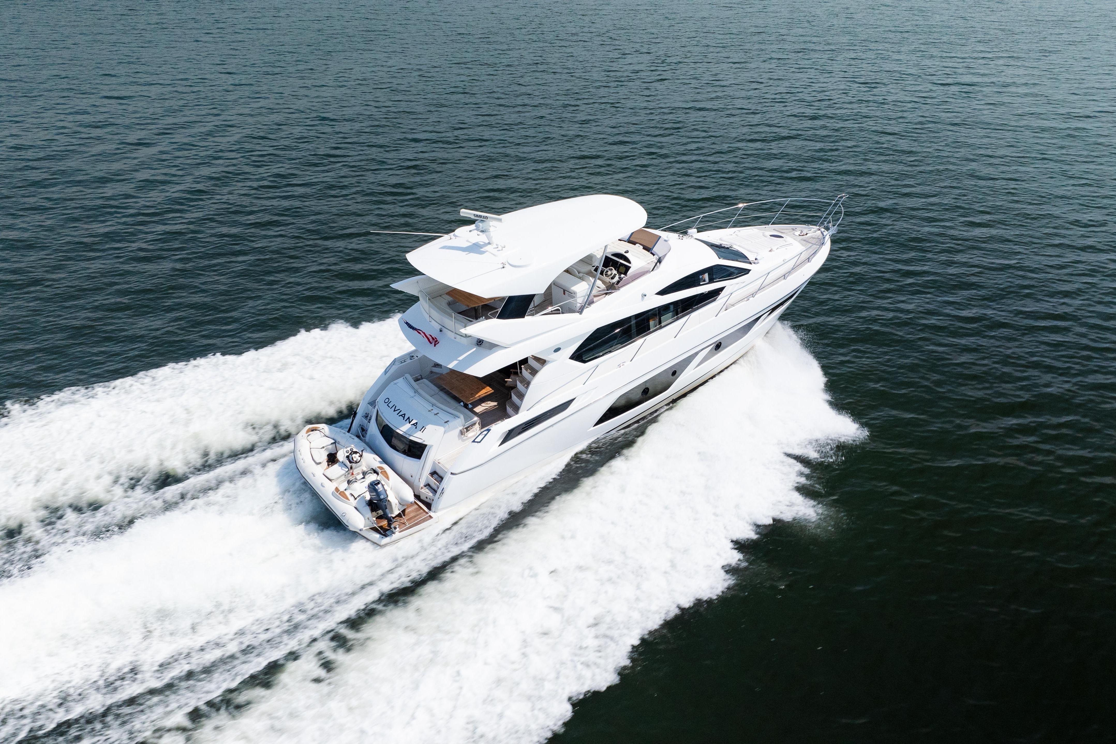 2016 Sunseeker Manhattan 65 yacht cruising on open water.