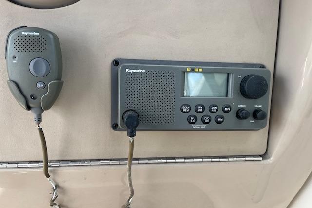Raymarine marine radio system on 2003 Sea Ray 260 Sundancer boat dashboard.