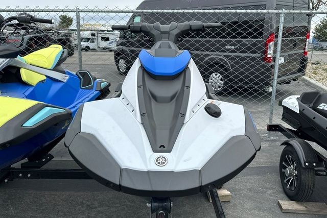 A Yamaha WaveRunner Jetblaster in black sits on a trailer, surrounded by other watercraft.