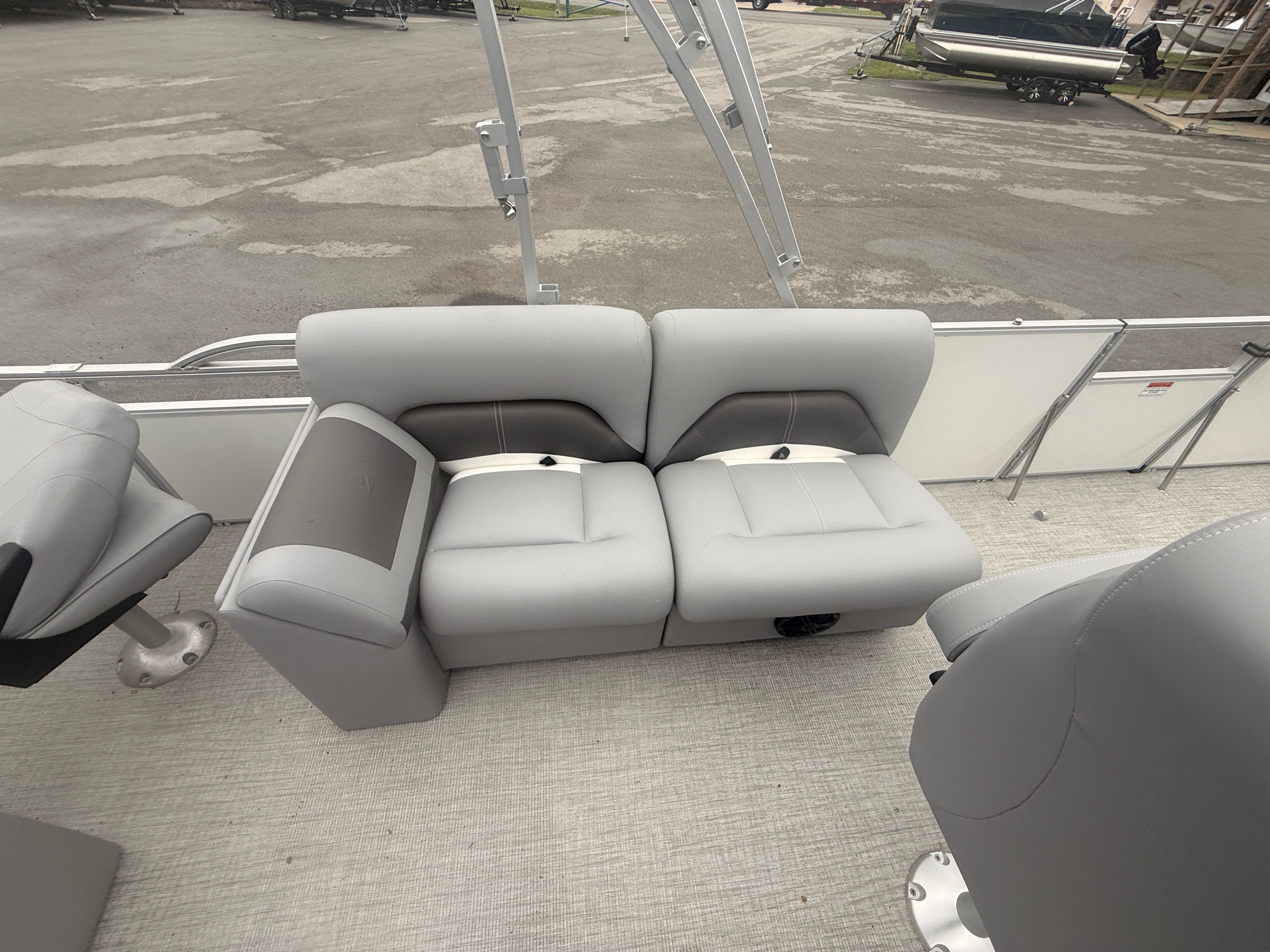 Interior of 2026 Landau Alure 23CC Fish with gray seating.
